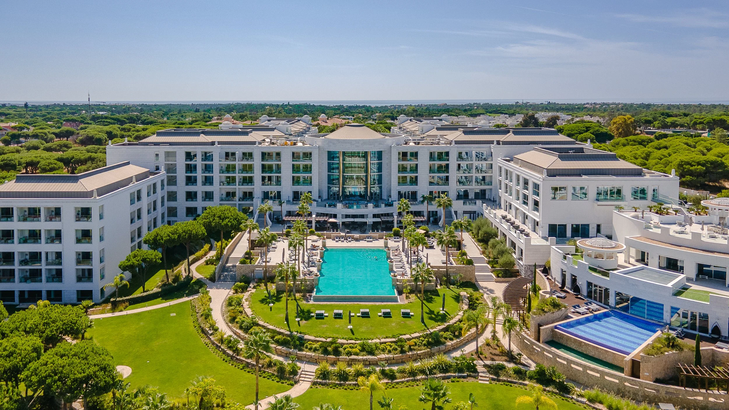 The Conrad Hotel Quinta do Lago on a beautiful Sunny day, this is the rear view over looking the pool and gardens.