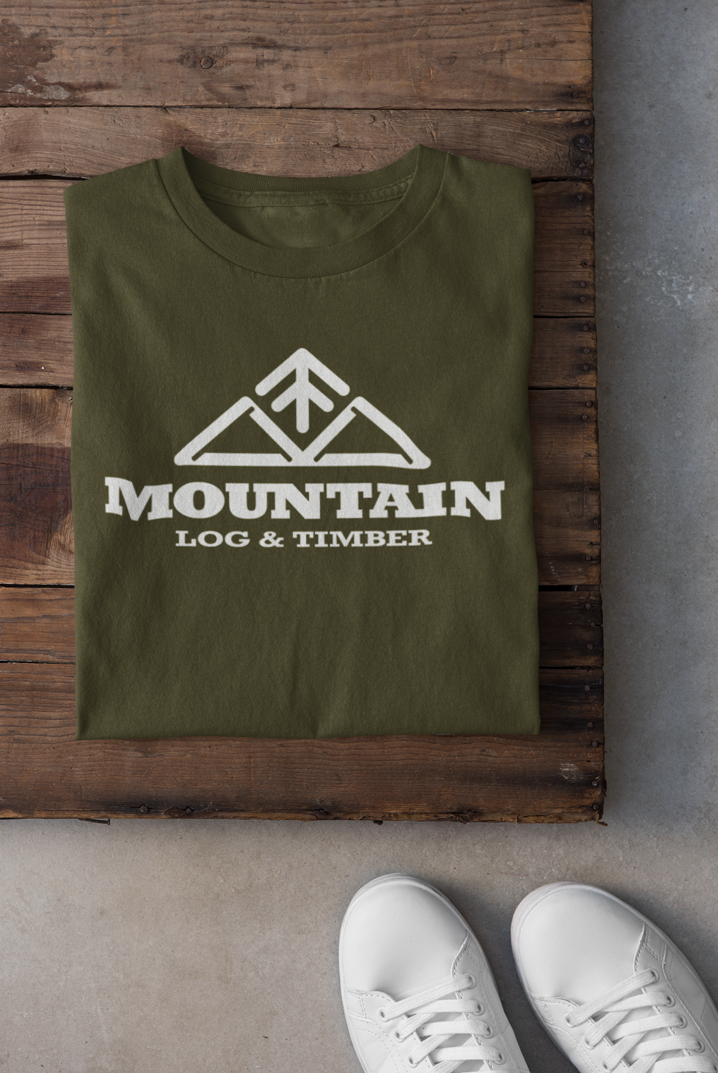 folded-tee-mockup-against-a-wooden-surface-33685 (1).png