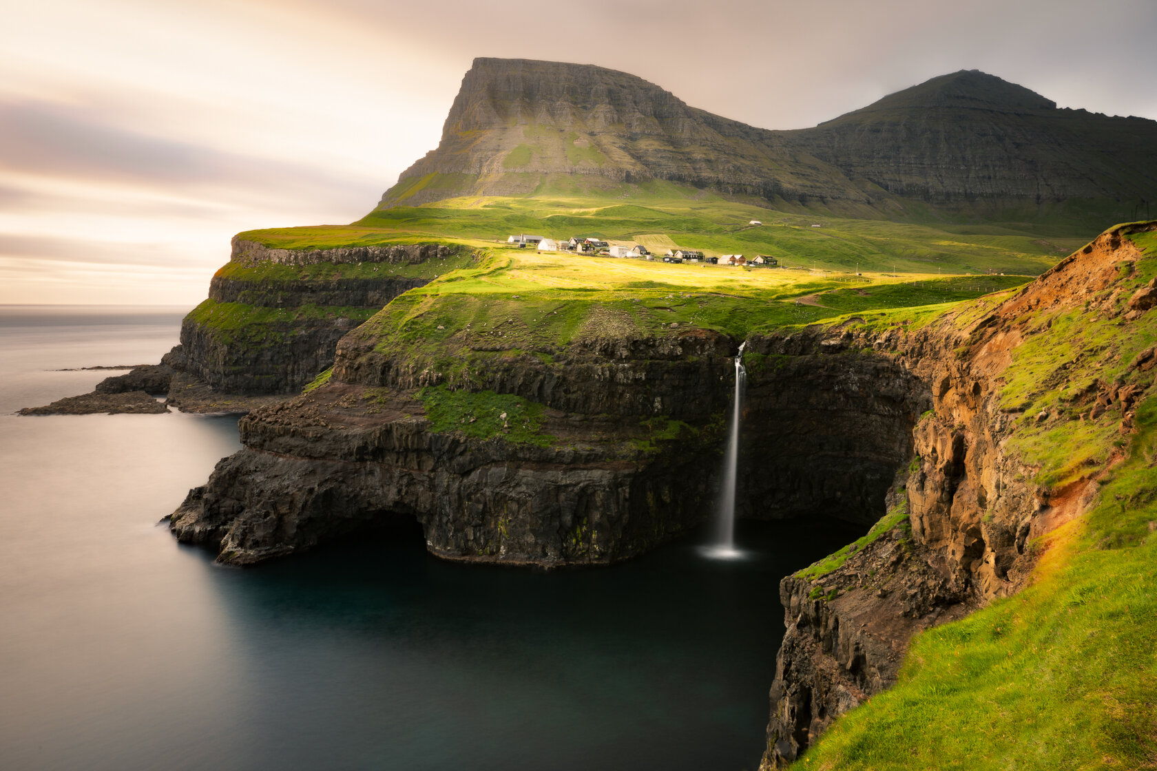 Múlafossur on a summer evening.jpg