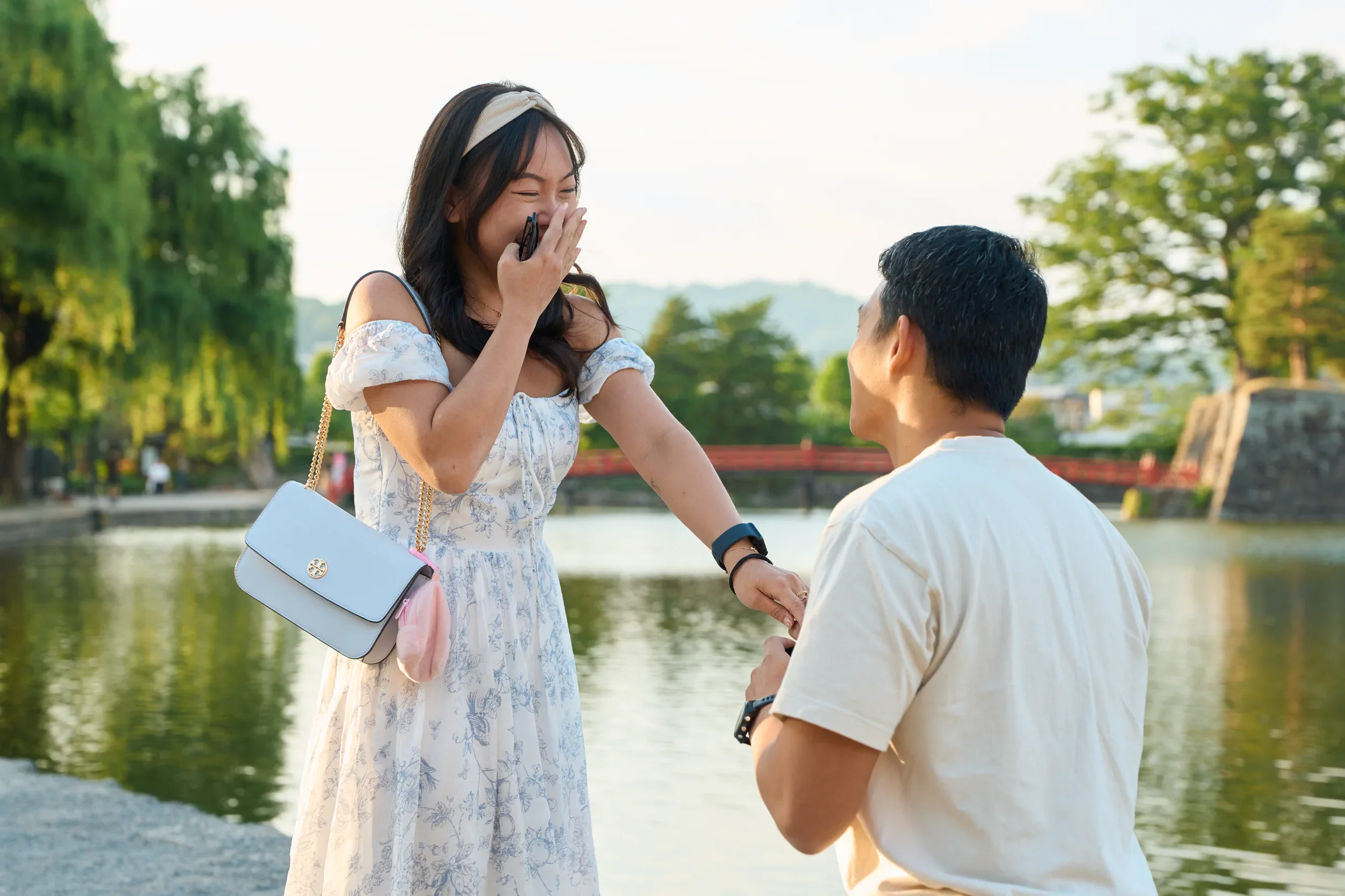Bride-to-be reacting in surprise to the proposal