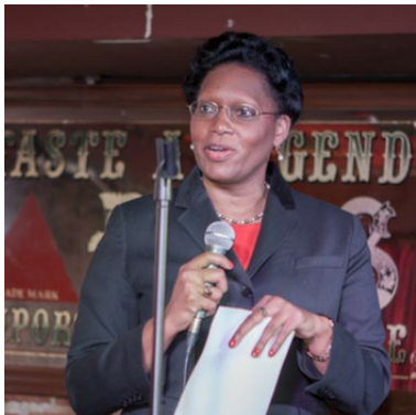 Picture of Carla Fleming Speaking at Event.PNG