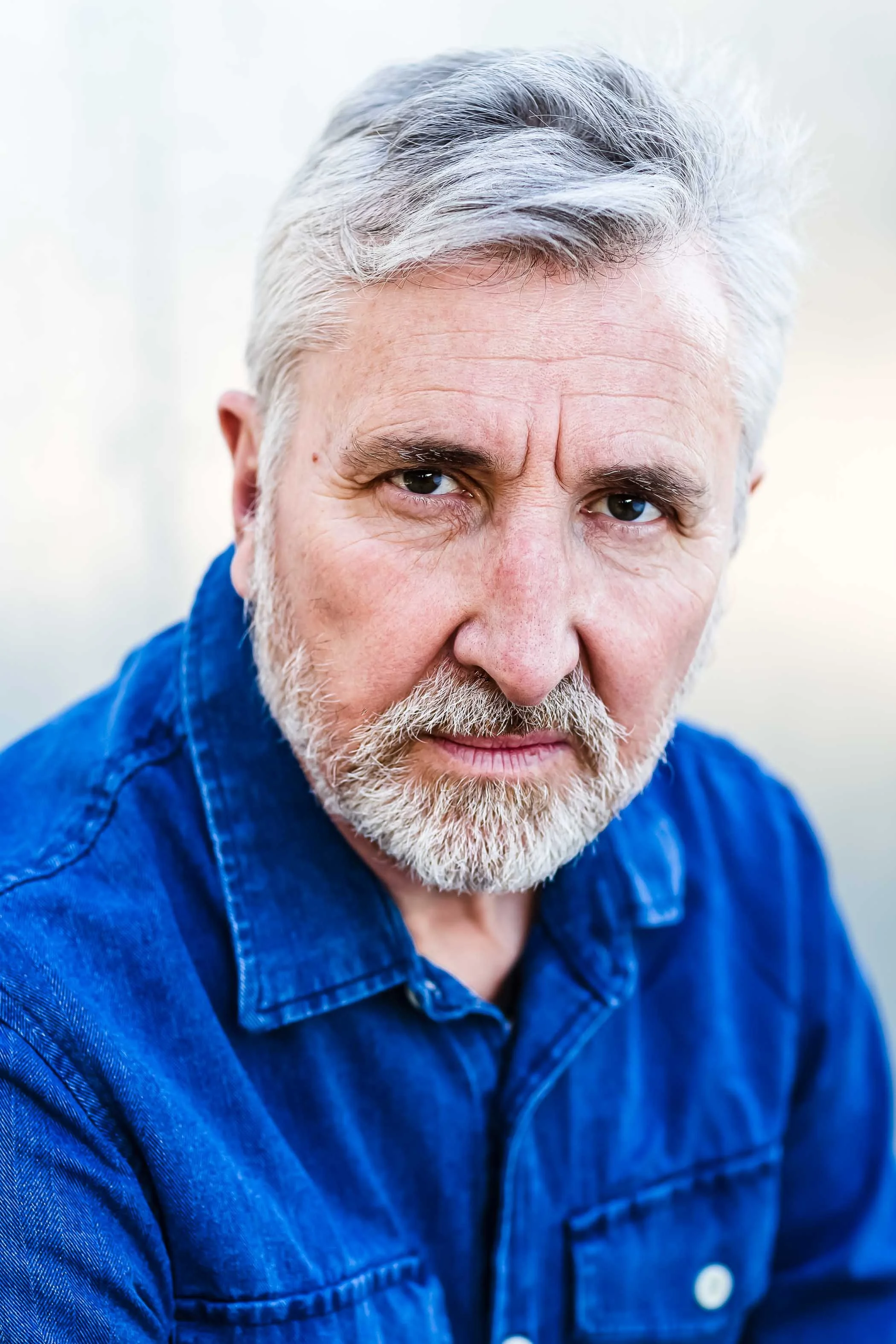 Portrait of male in denim shirt