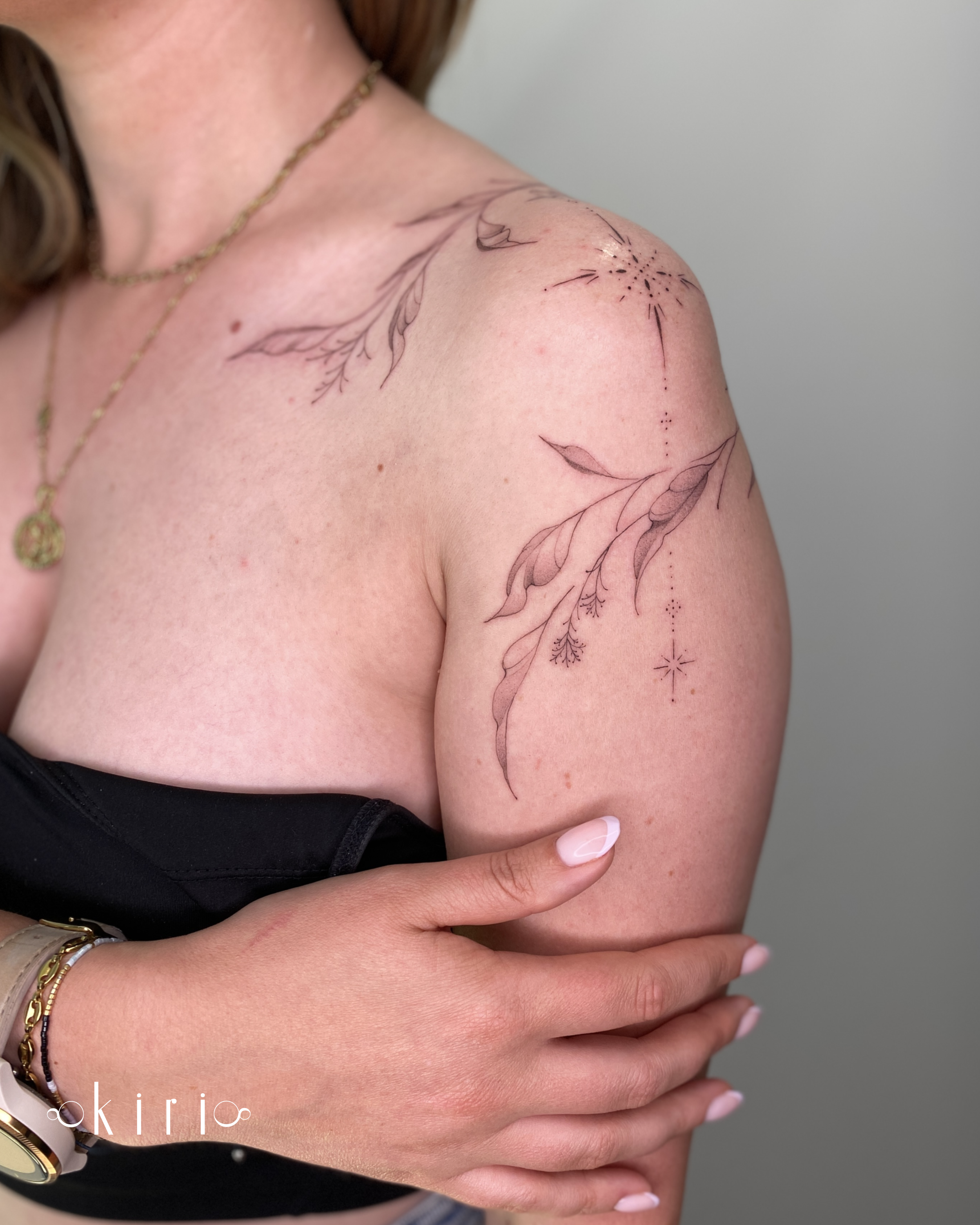 vine-ornamental-shoulder-wrap-around-fine-line-tattoo-birmingham-uk.PNG