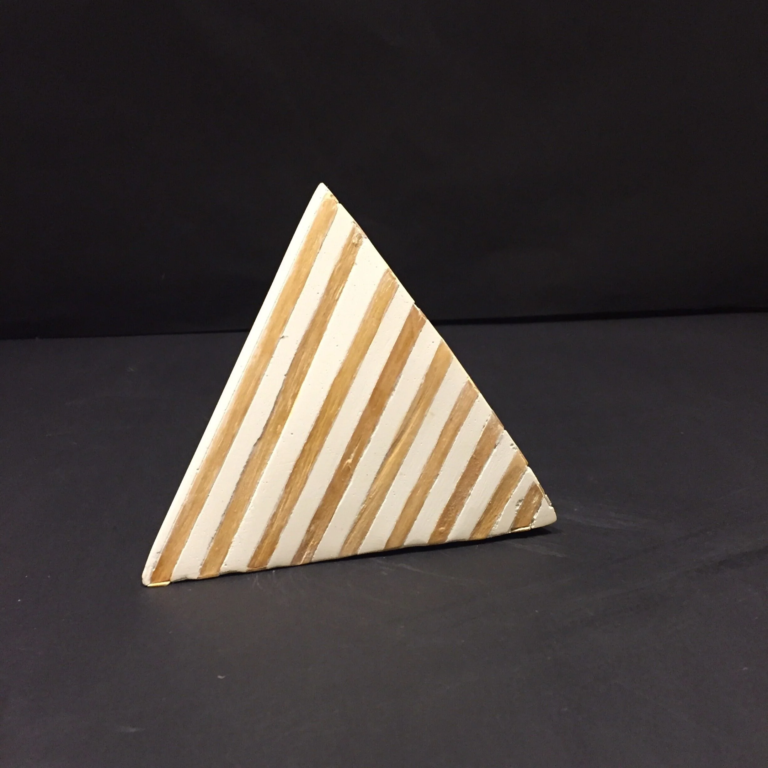 Medium: Ceramic and wood.