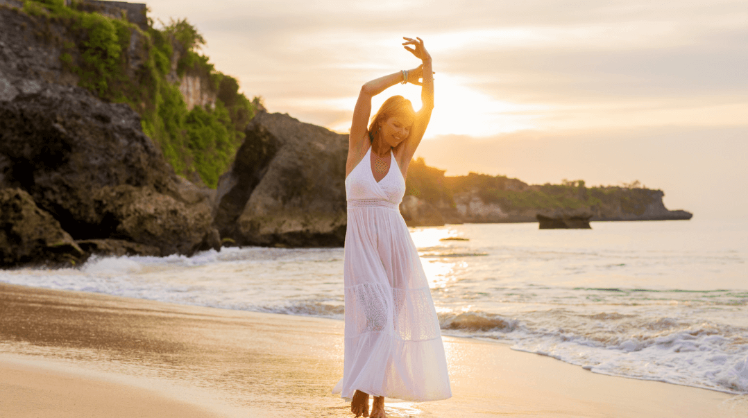 Woman walking on the beach