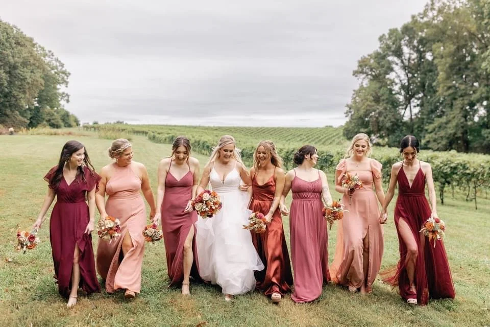 happy bride and maids vineyard.JPG