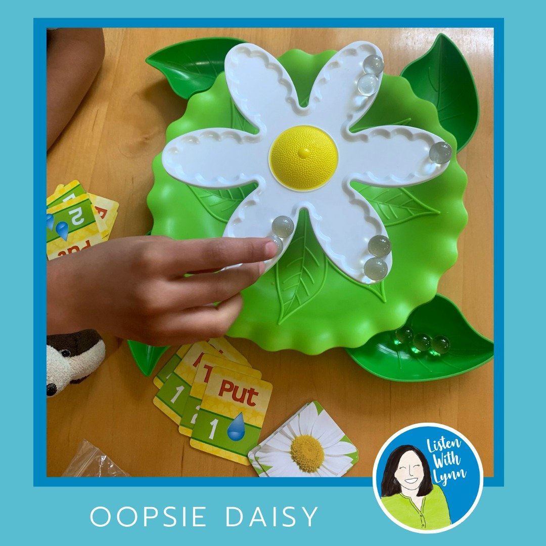 🌼 Oopsie Daisy 🌼  is a quick-to-play summertime game. The clear marbles look like raindrops balancing on the wobbly flower petals. Oopsie daisy! Lose your marbles and win the game!

Oopsie Daisy is a reinforcing game that can be played with many Li