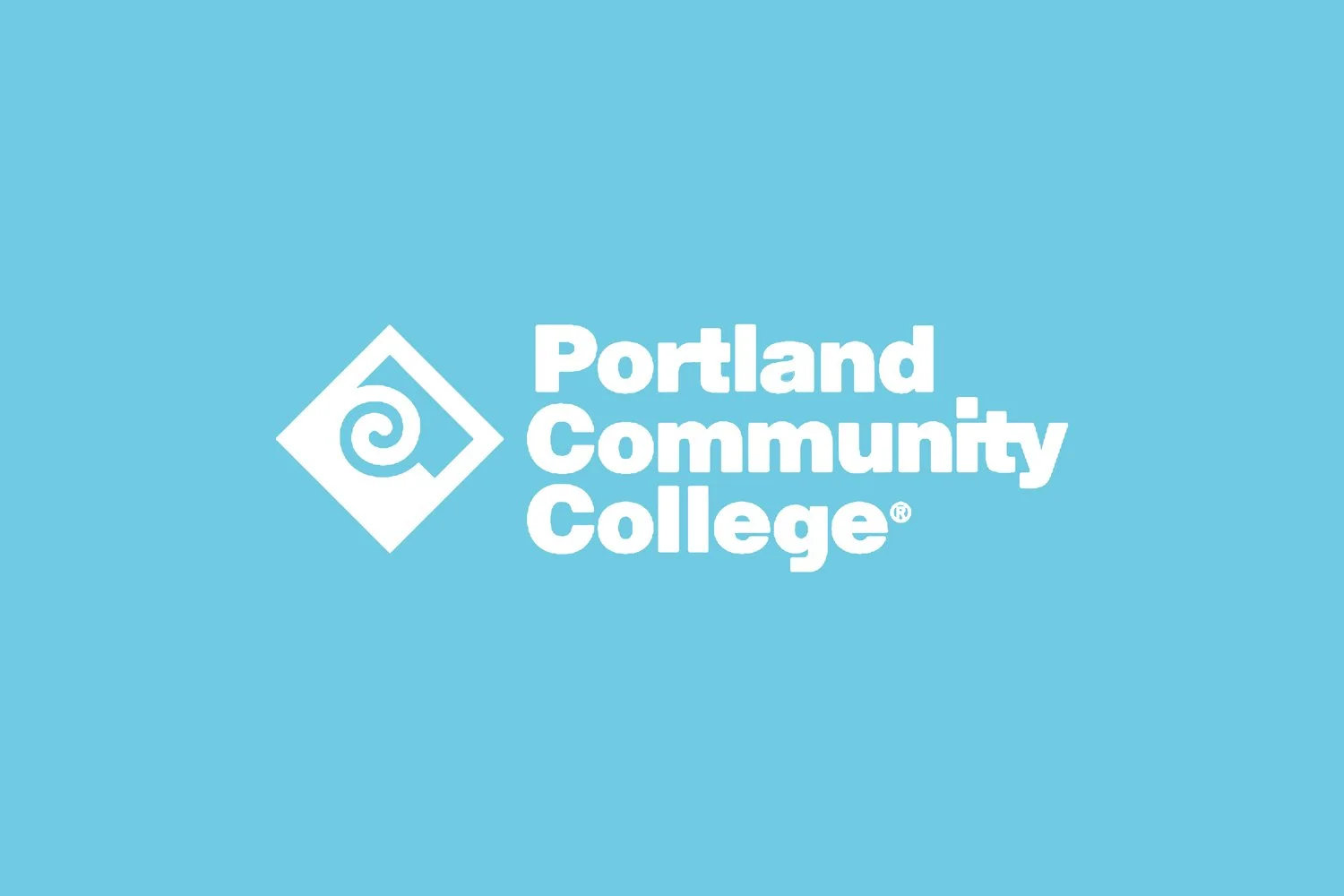 white pcc logo on a blue background
