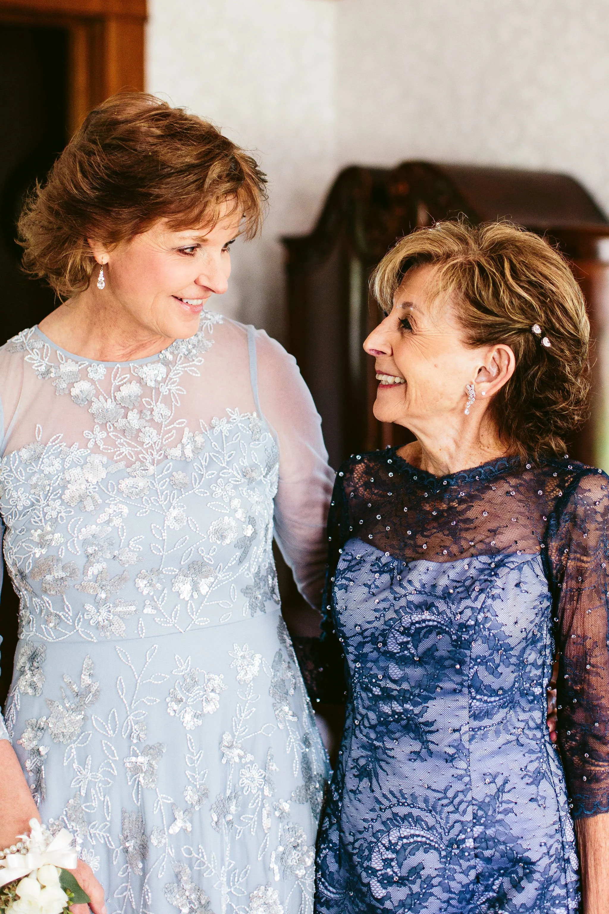 Mom receiving hair & makeup in Wisconsin