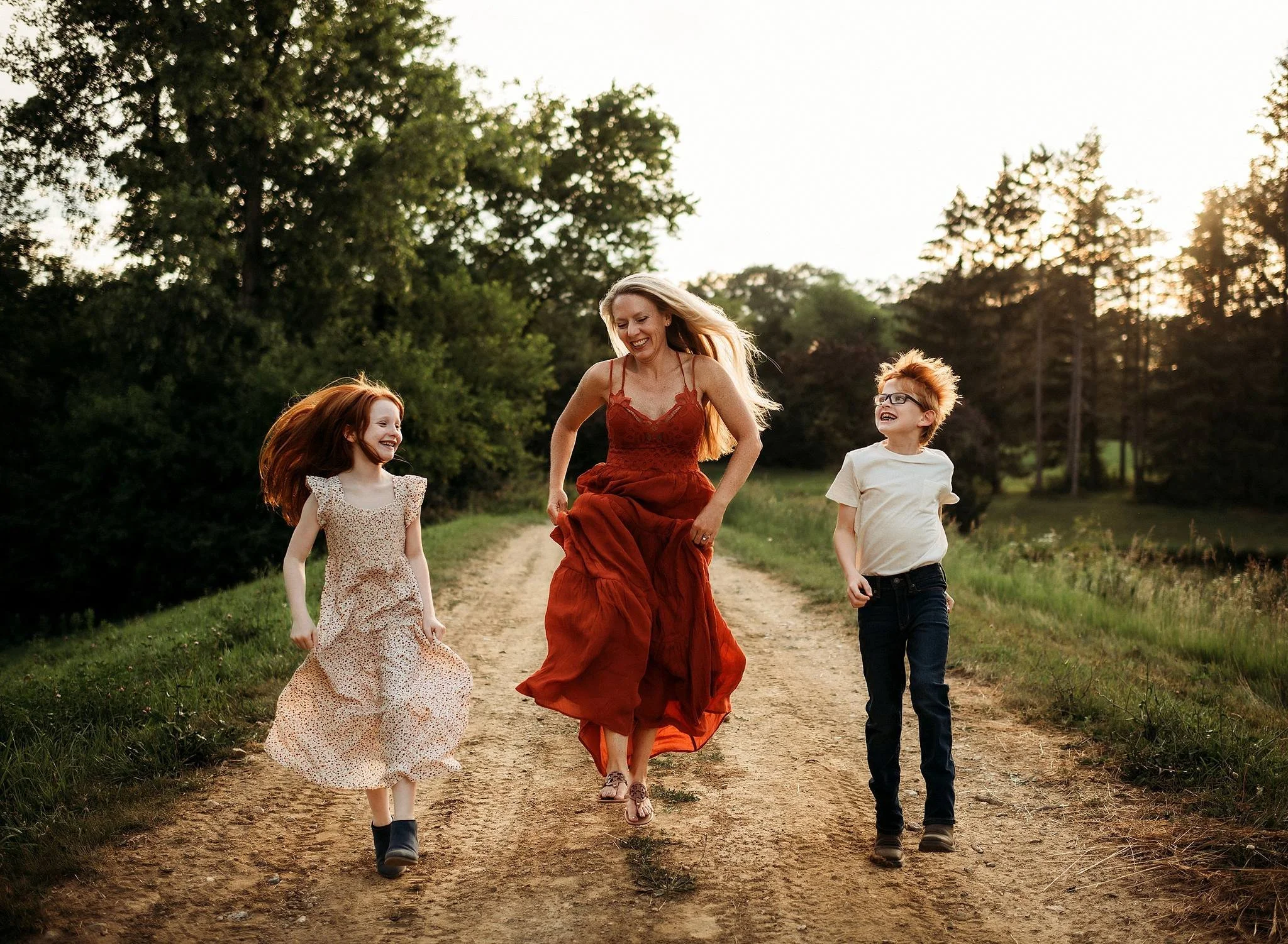 mom and kids skipping along