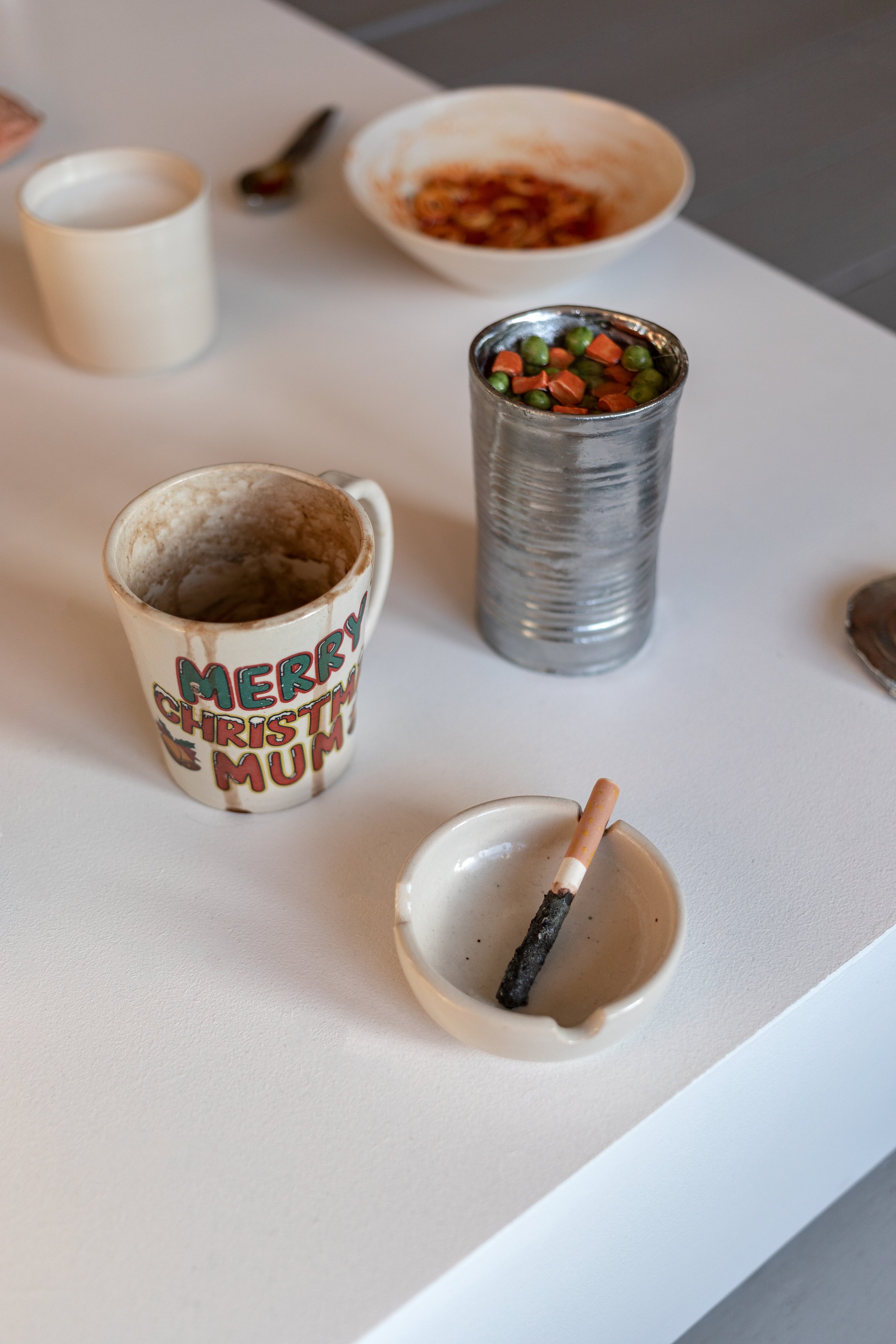 Dirty Mug, Tin Can and Ashtray