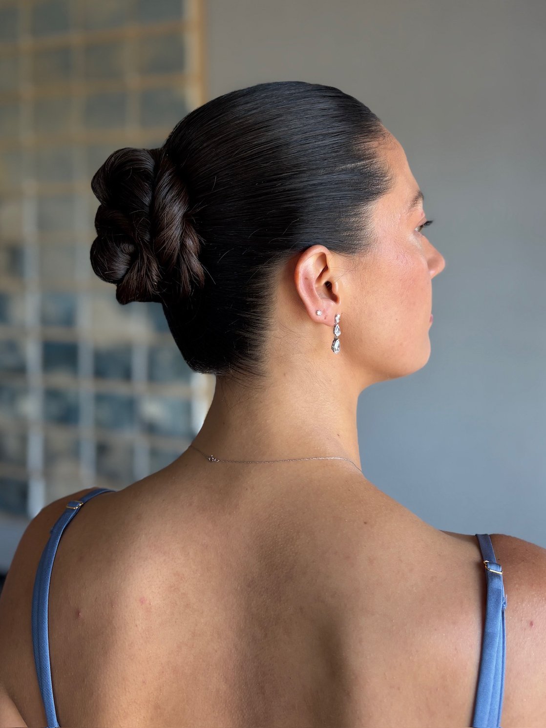 sleek midi bun