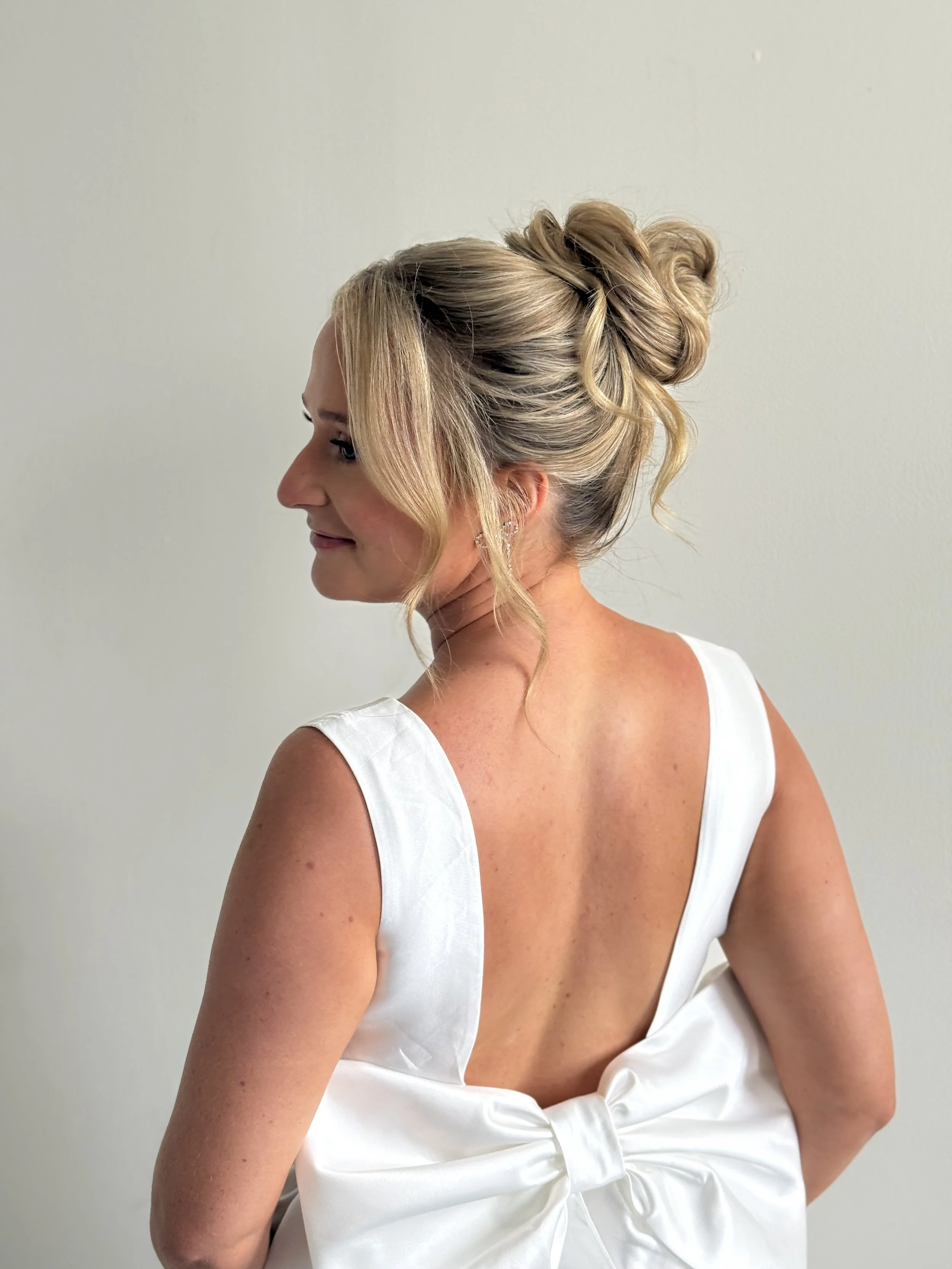 tousled high bun
