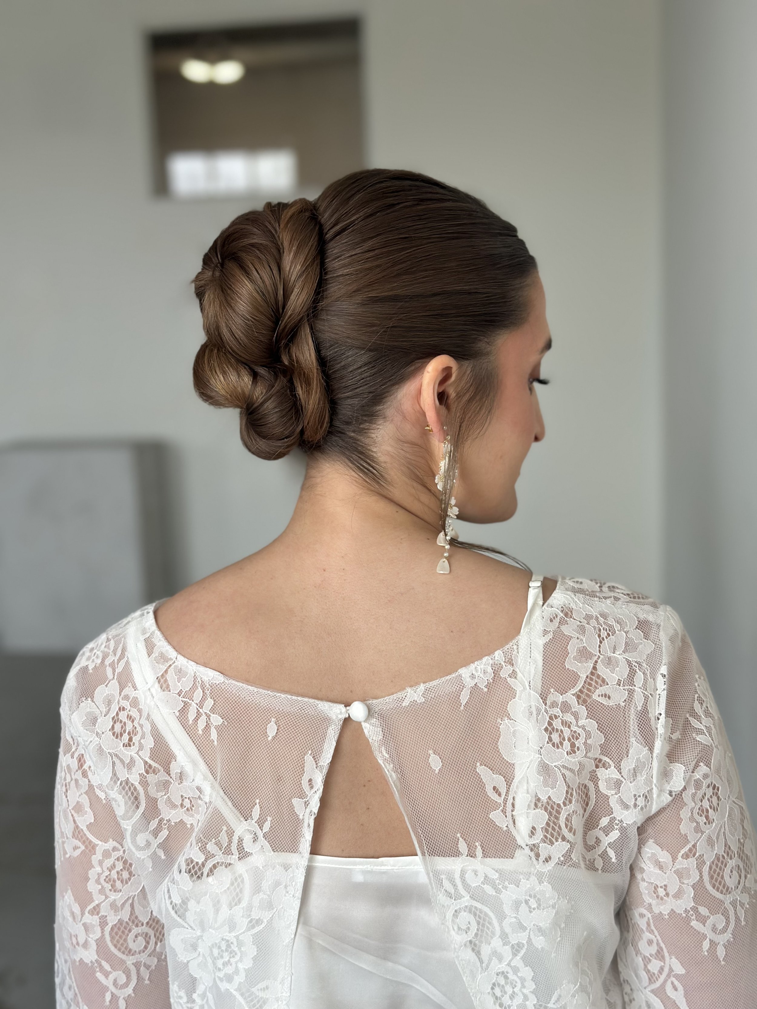 sleek midi bun