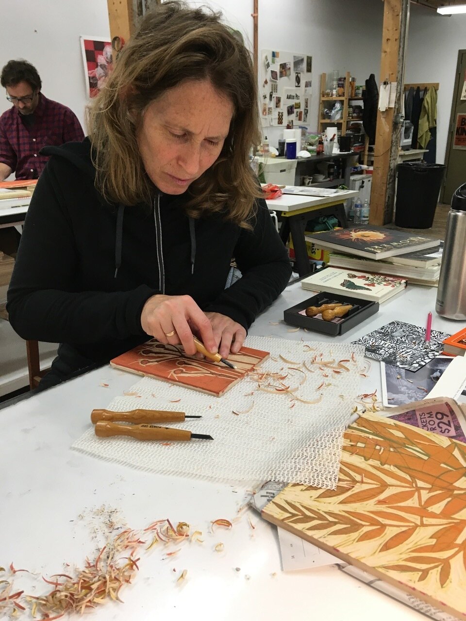  Nancy carving woodblocks with Japanese carving tools, soon to be printed. 