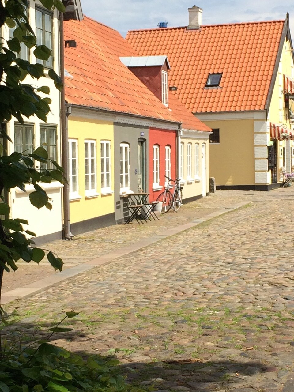  This is the street that one can see out the window of the workshop, which is where fairy tale author Hans Christian Andersen was born in 1805. It is the old, very picturesque part of Odense, the 4th largest city in Denmark. 