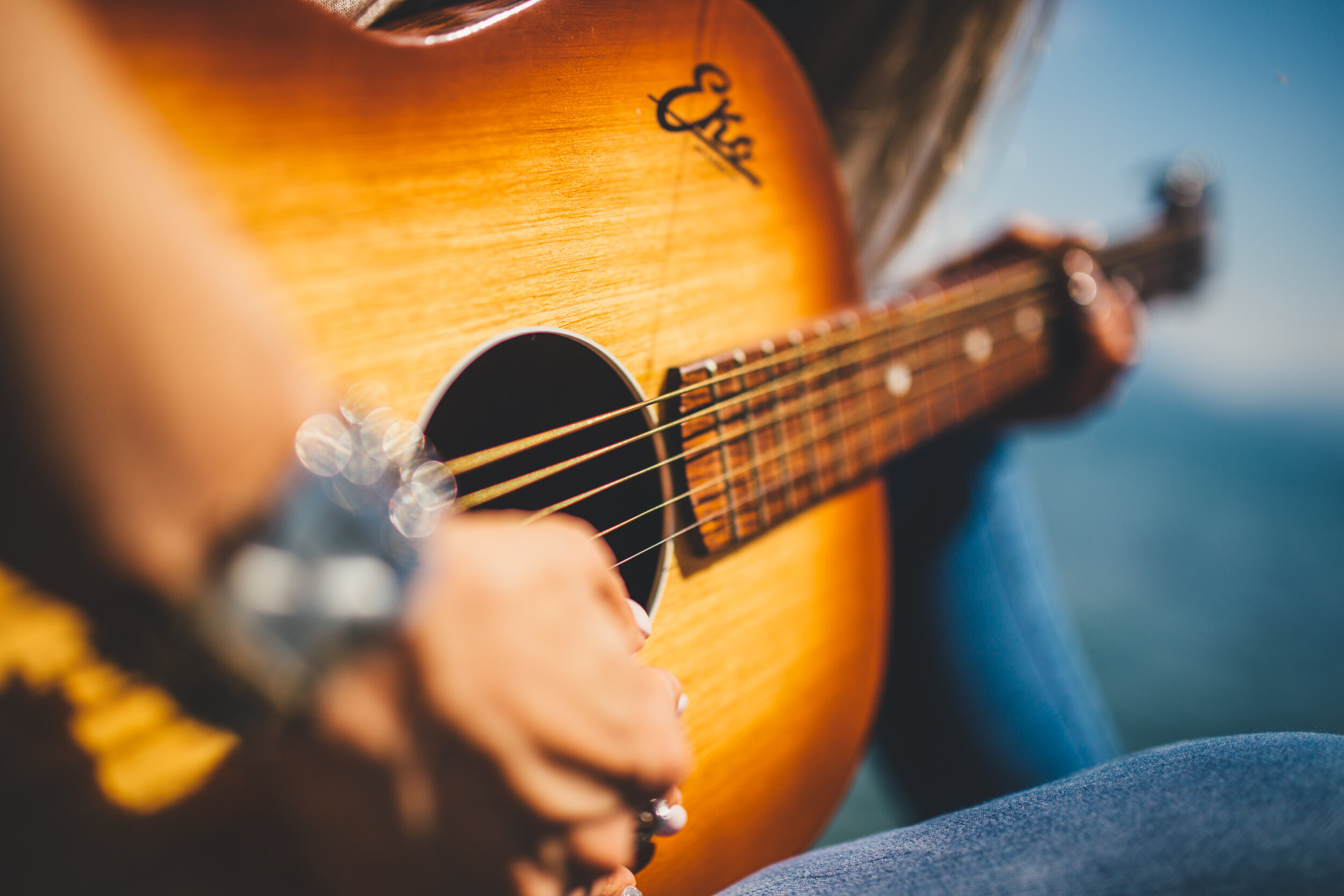Canva - Person Play Guitar in Close-up Photo.jpg