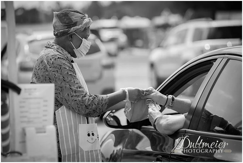  Norma Larsen delivers a purchase. 