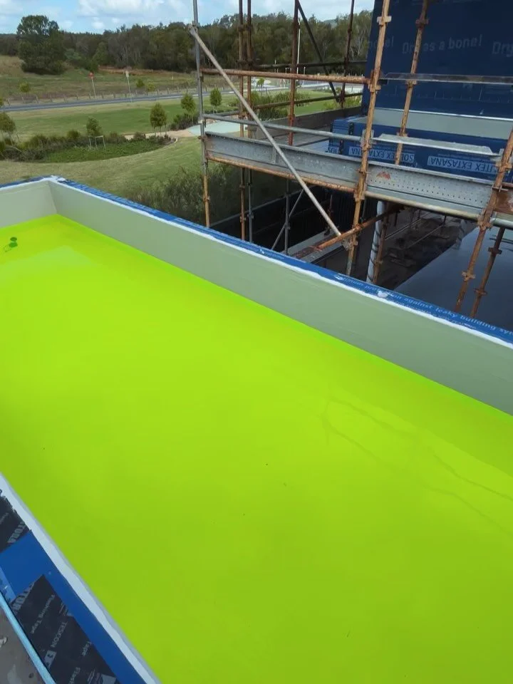 Flood testing is underway for these planter boxes! Tracer dyes have been introduced into the water to help pinpoint any potential leaks during this rainy weather. By using two different tracer dyes for adjacent planter boxes, we can quickly identify