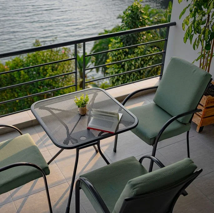 inn-on-the-lake-room-balcony-3-chairs.JPG