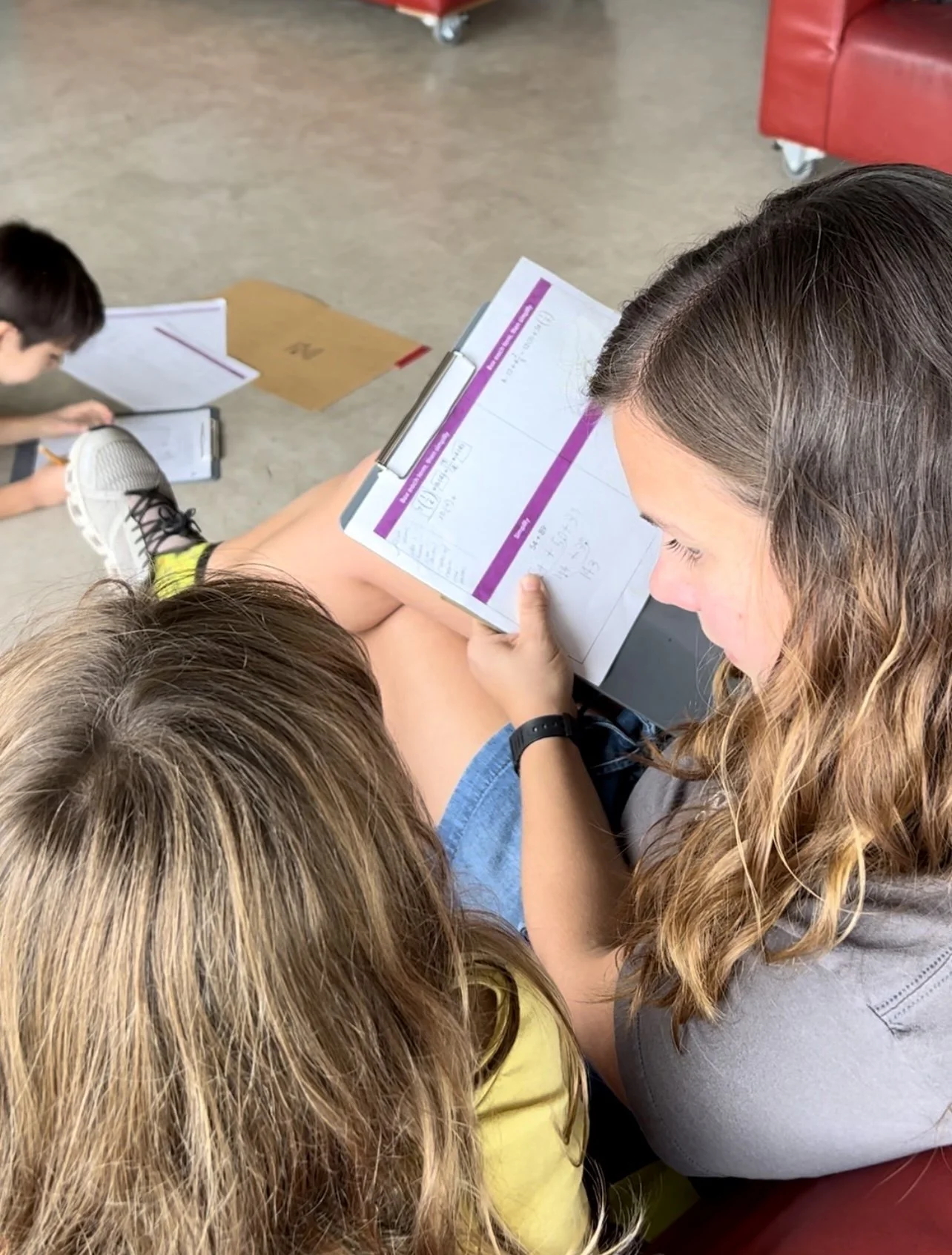 Assessment at Long-View: To “Assess” is to“Sit Beside”
