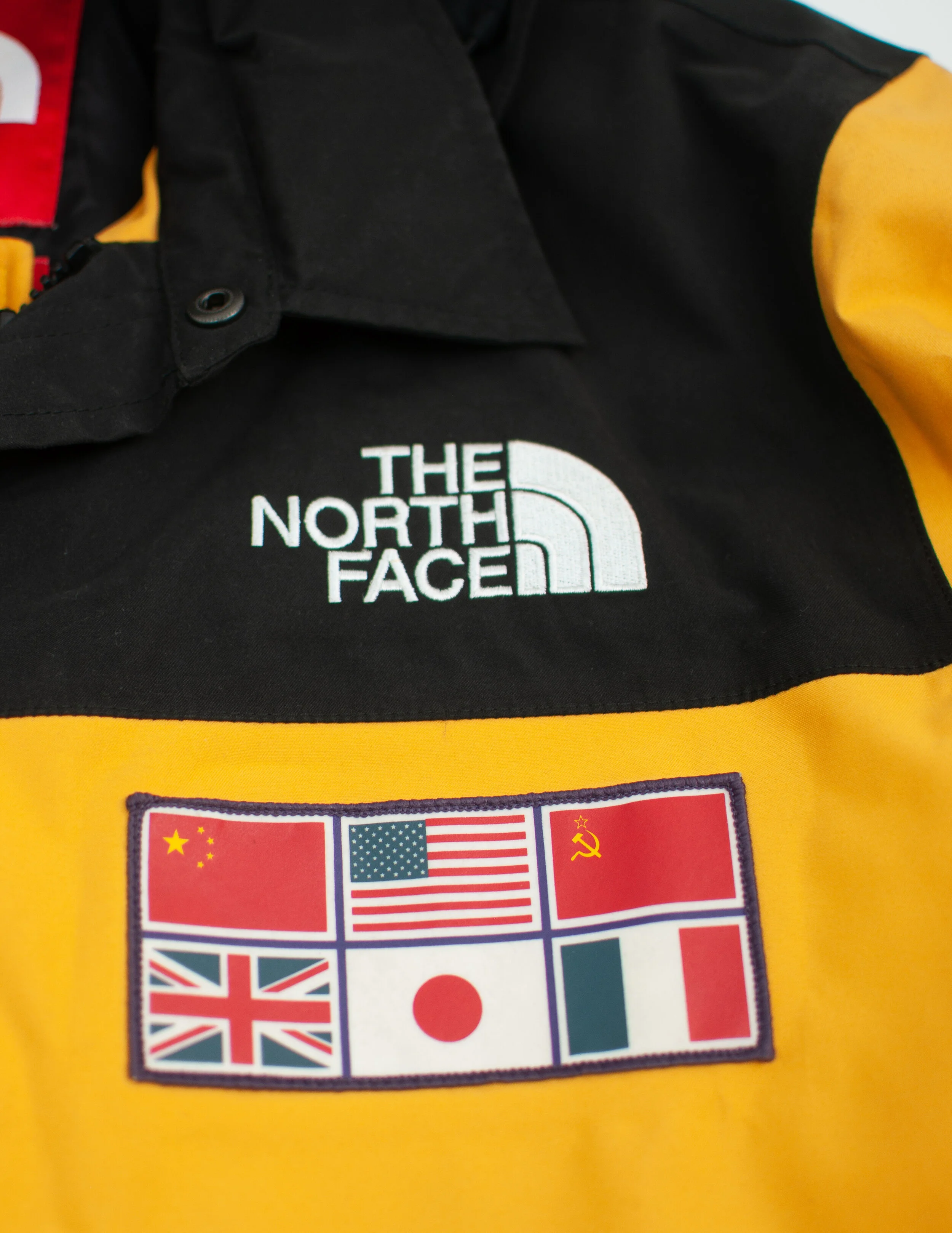 supreme north face flag jacket