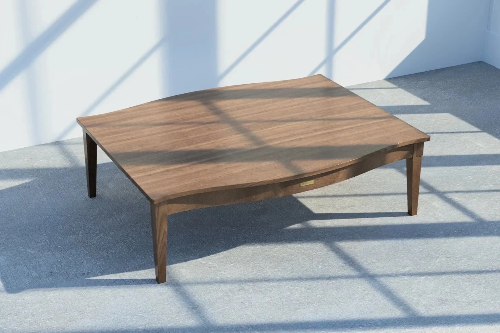 Glencairn Furniture's Telfer coffee table in mahogany viewed from an angle.