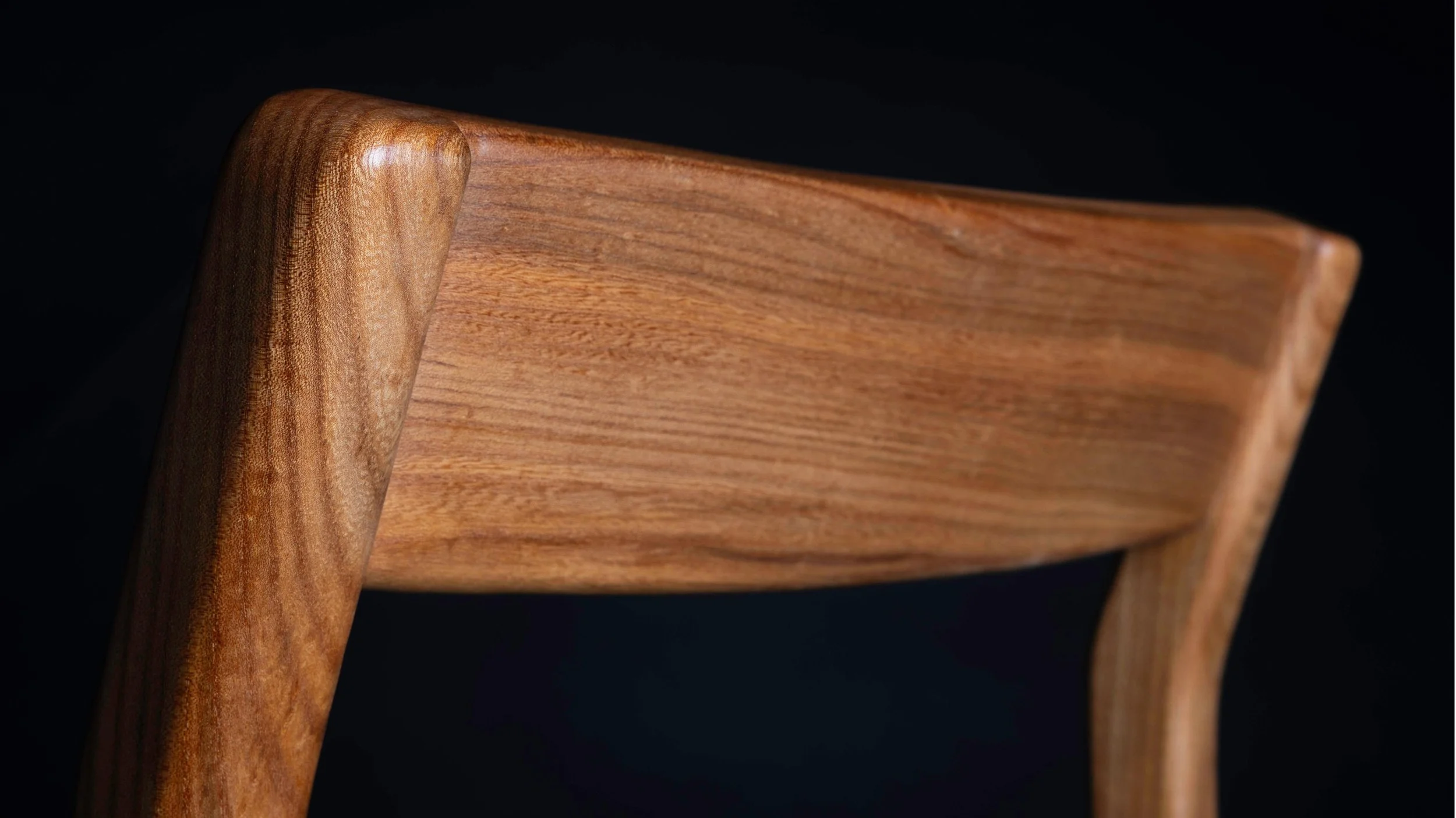 Back view of Clava dining chair backrest.