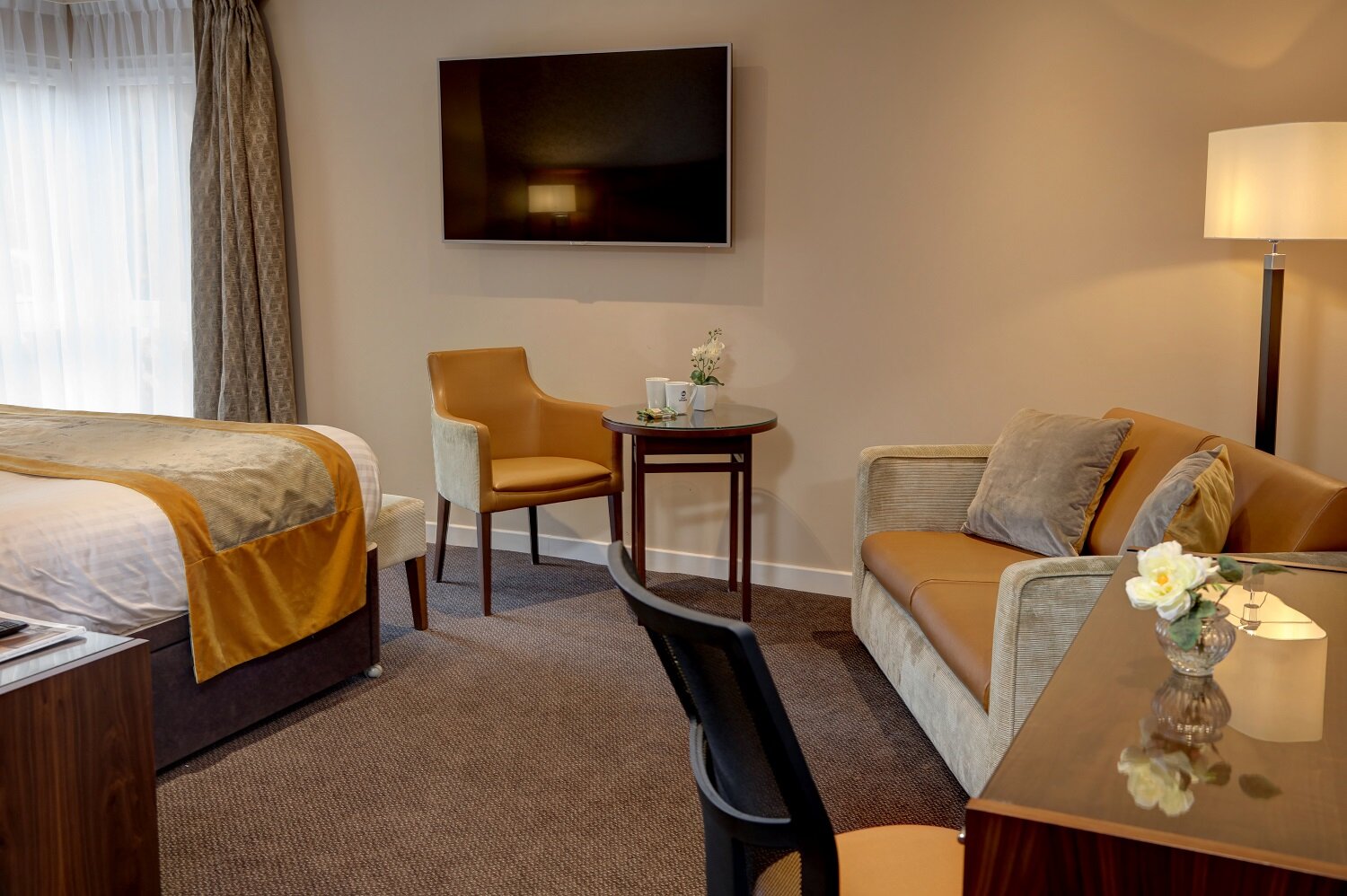 Coin salon chambre Invercarse Hotel