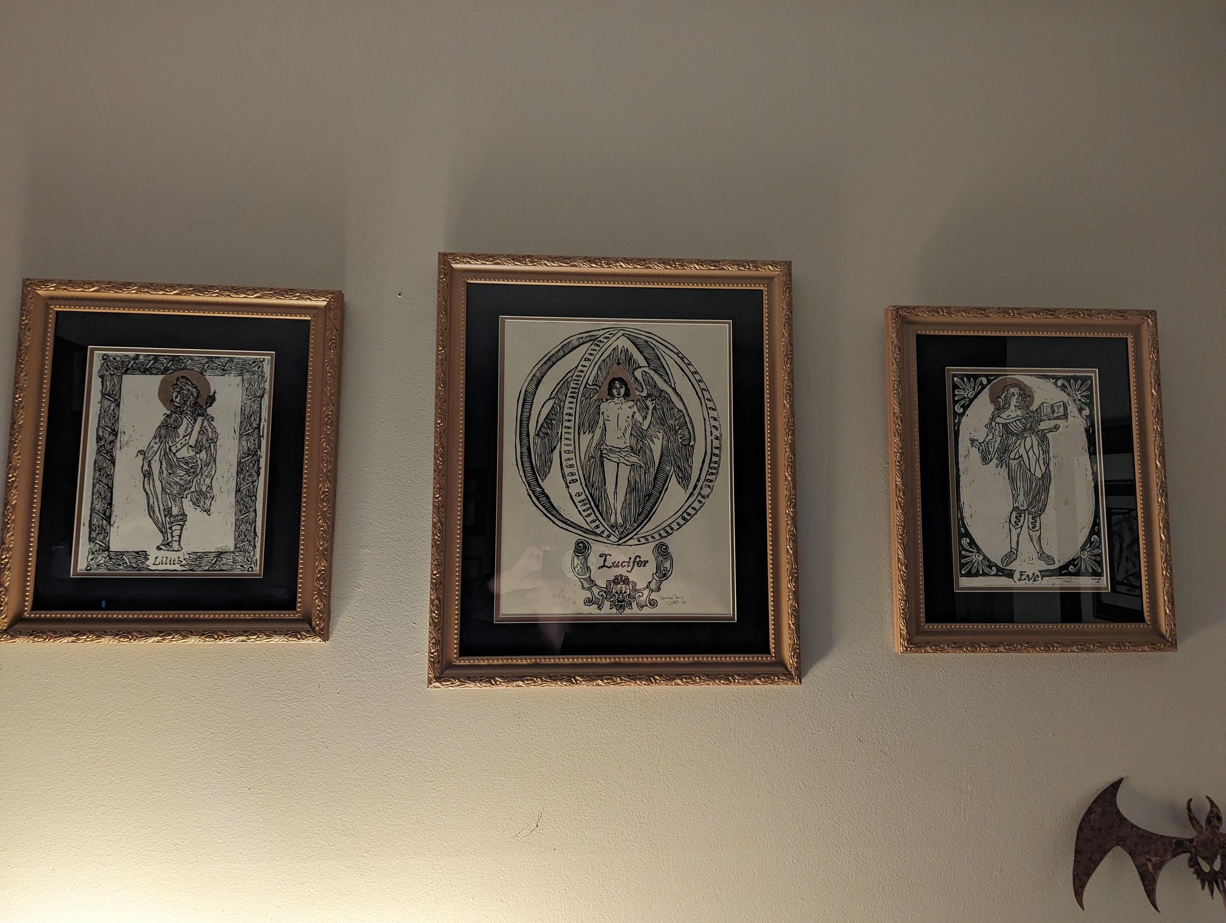 A very poor picture of Triptych that took me about a year to finish- Lilith, Lucifer, and Eve.
Depicted negatively in Judeo-Christain religions, I wanted to represent them using symbols and imagery usually reserved for saints.