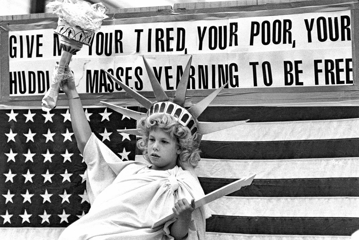   [6] A float honors the 100th anniversary of the Statue of Liberty, July 7, 1986.   Photograph by Amy Sweeney. &nbsp; 