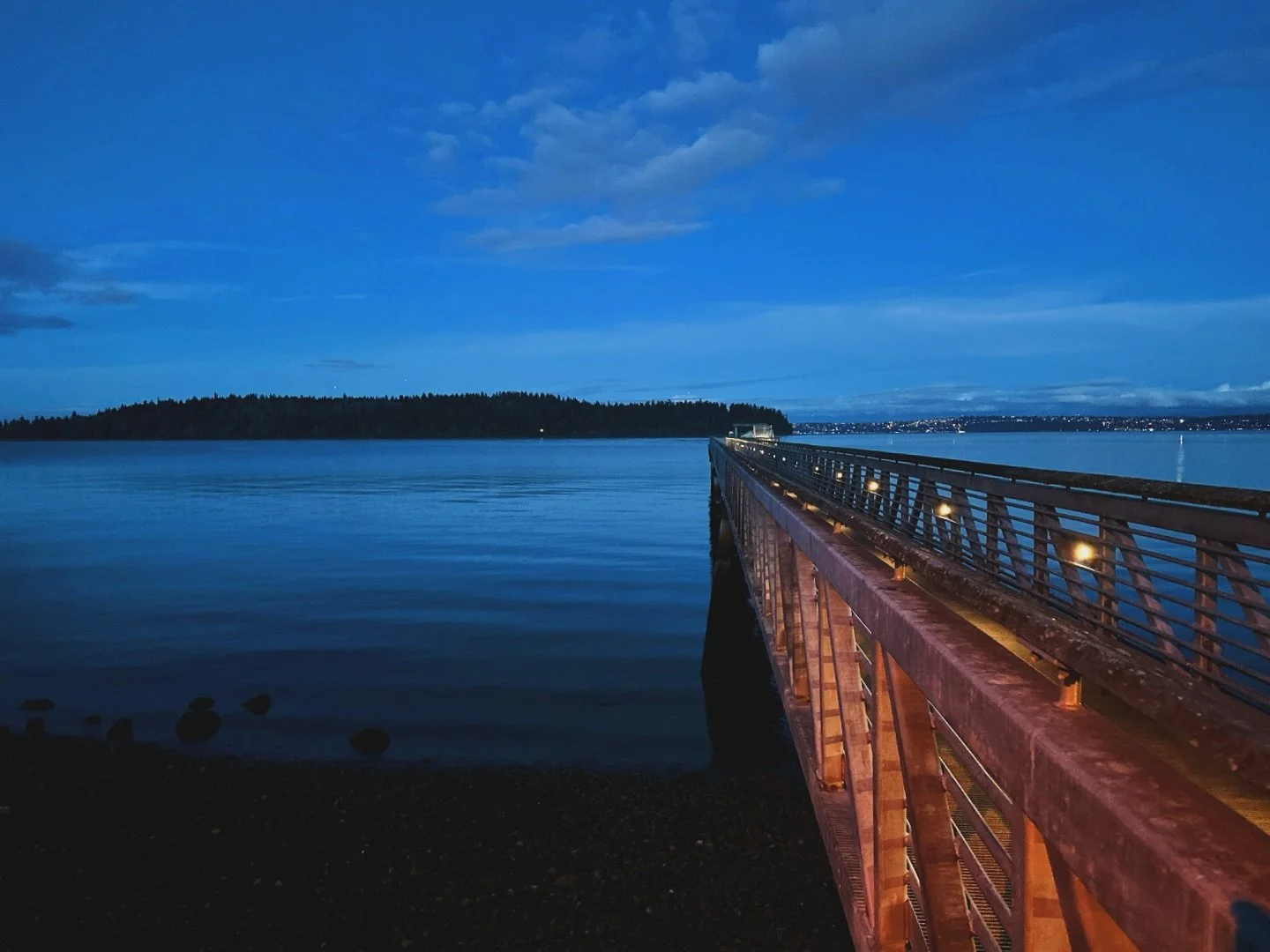 Greetings from the blue hour at Harper Pier. All along the 371 miles of shoreline that traces the Kitsap Peninsula docks and piers, some with names, many without, jut into the waters of the Salish Sea. Each has its own character, its own story. This 