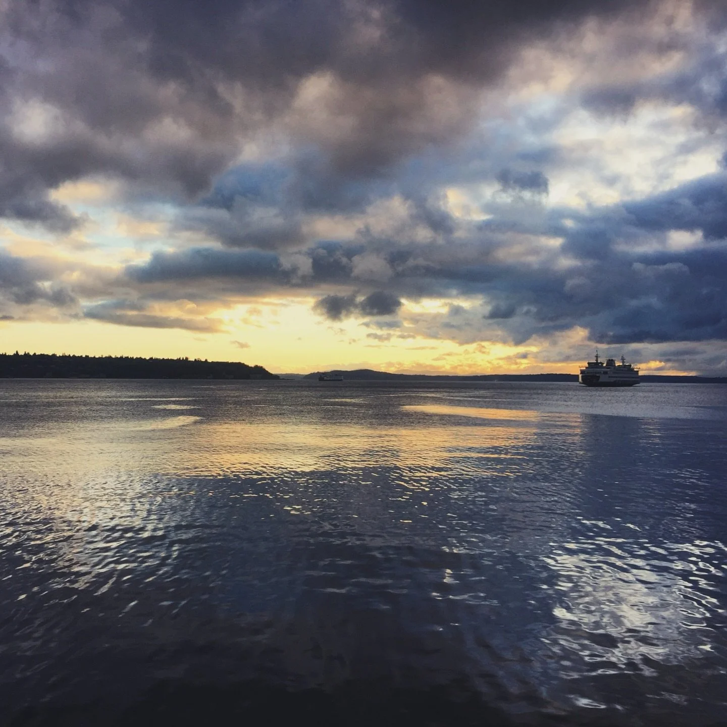 Happy Ferry Friday - rain or shine the ride is always mighty fine! Here is the view from the Seattle waterfront watching a Bremerton boat come in to dock. The Puget Sound echoes the sky in its dramatic display of light and color. Every day is differe