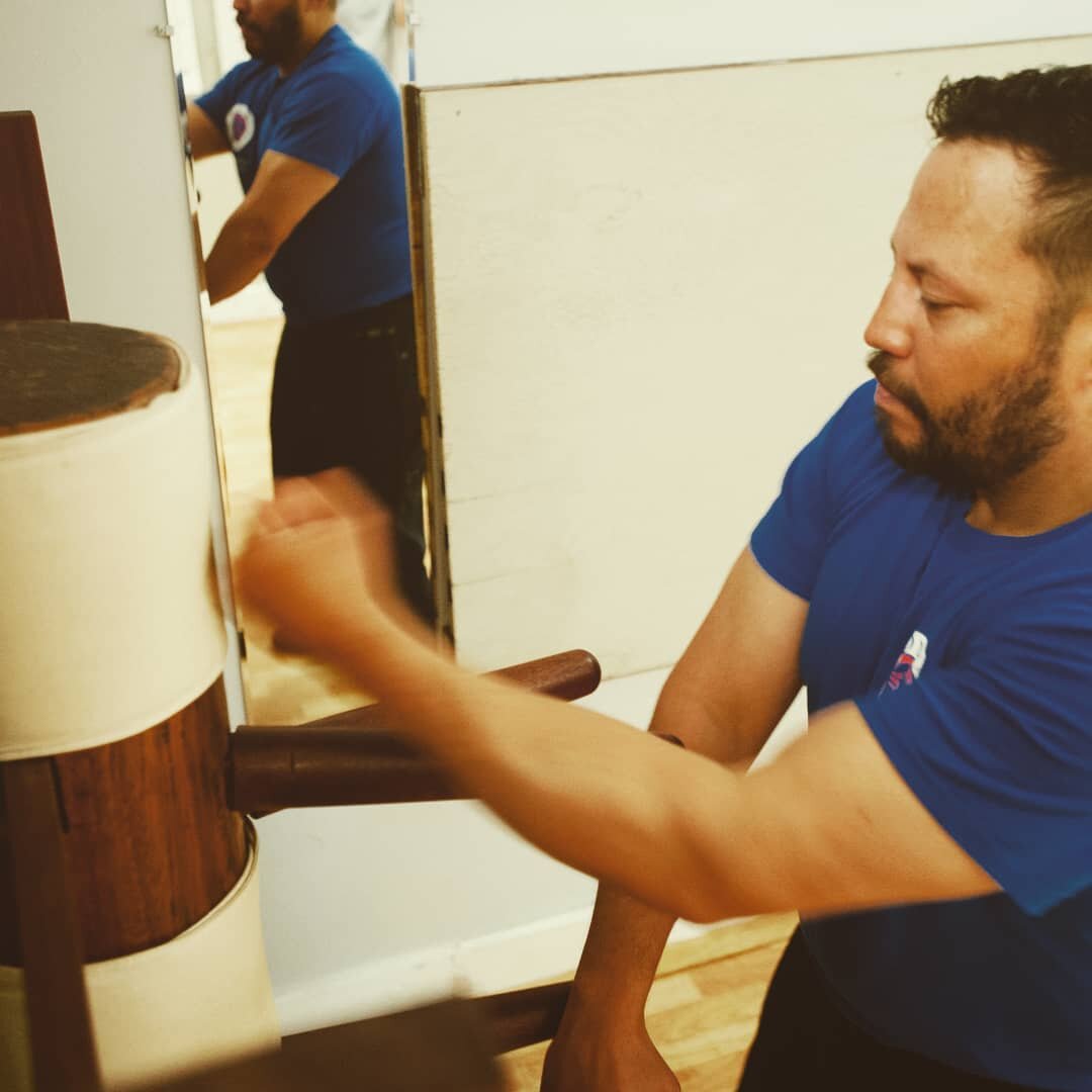 Sifu Barry O'Brien training on the Wooden Dummy aka Mum Tan Jong. The Wooden Dummy trains timing, distance and proper energy. It also has the advantage of toughening the forearms and hands which is a form of Iron Body training.