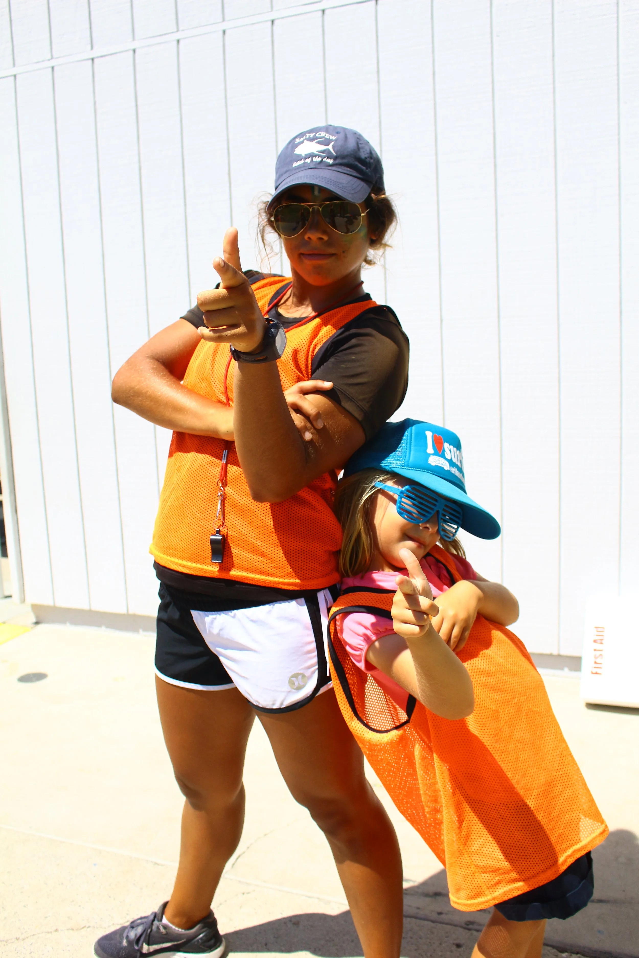 Coach and camper posing image