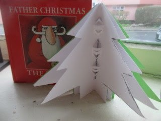 Father Christmas book and tree.jpeg