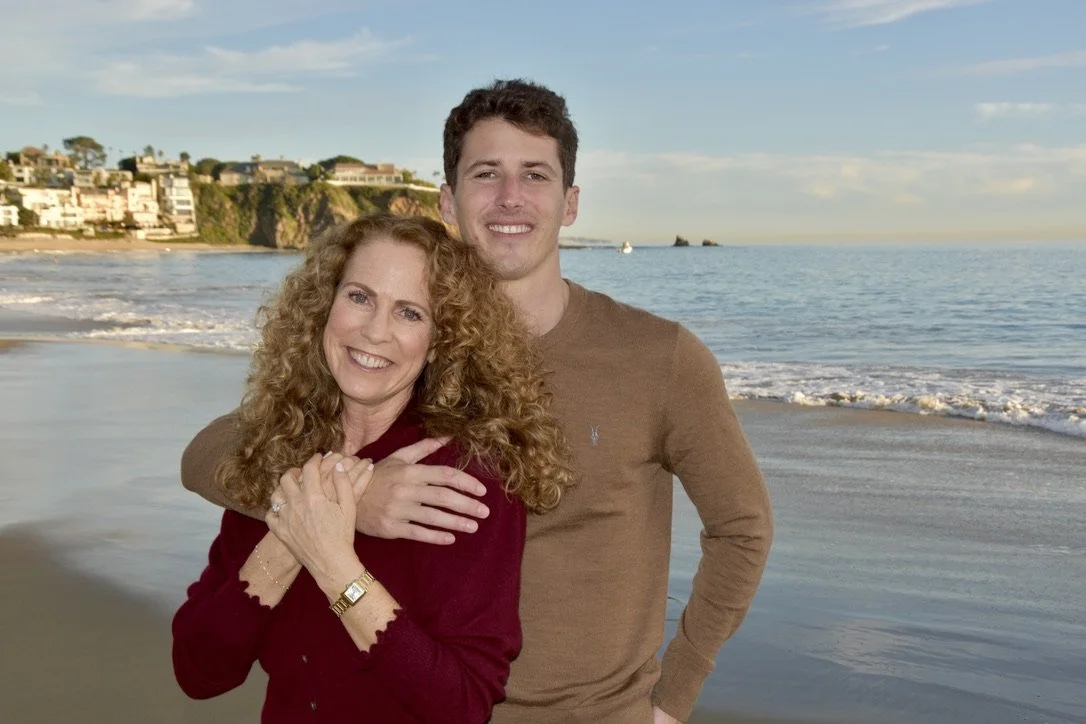 Jeanine Mouchawar and her son at the beach, smiling together