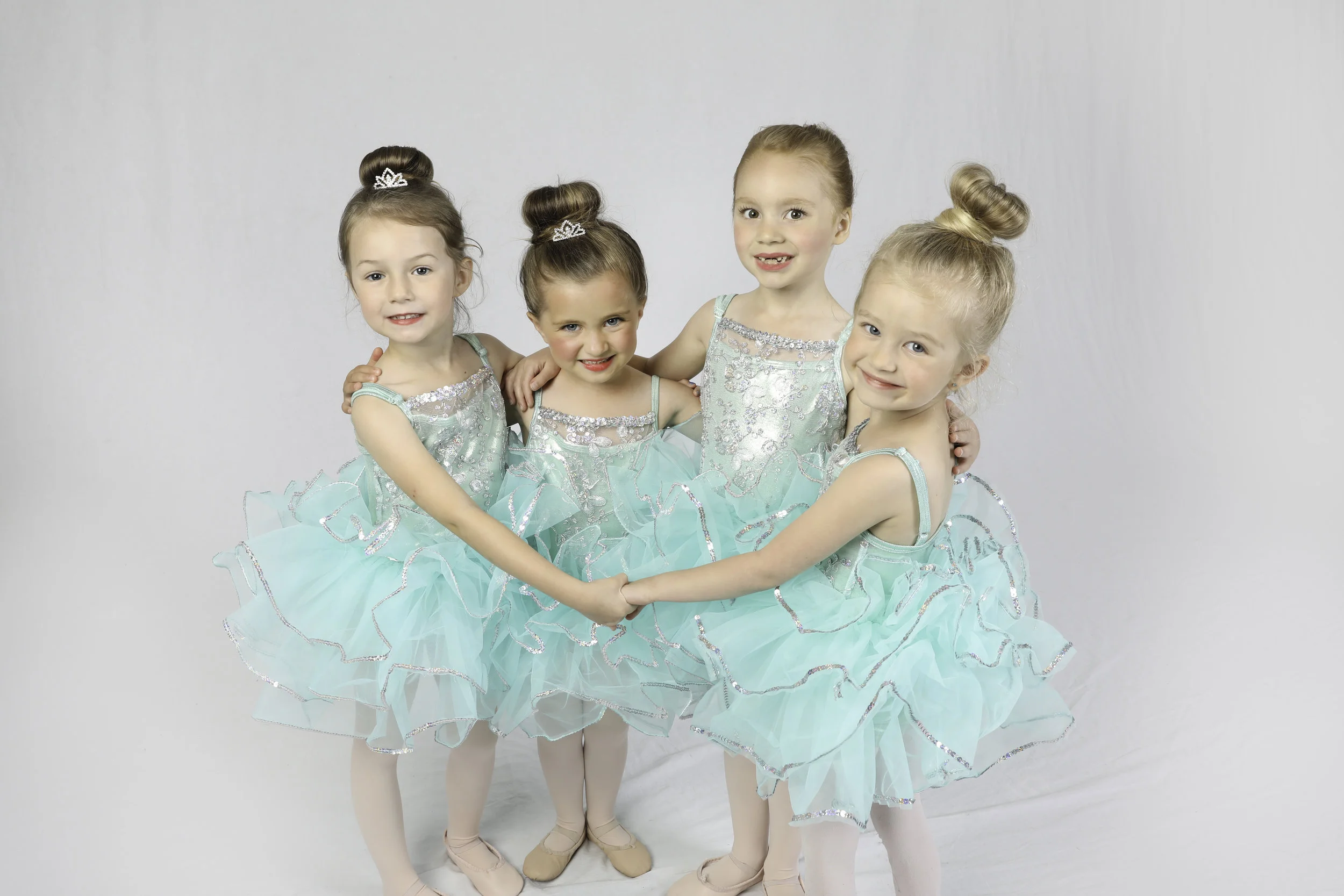 marcus 2019 tutus holidng hands.jpg