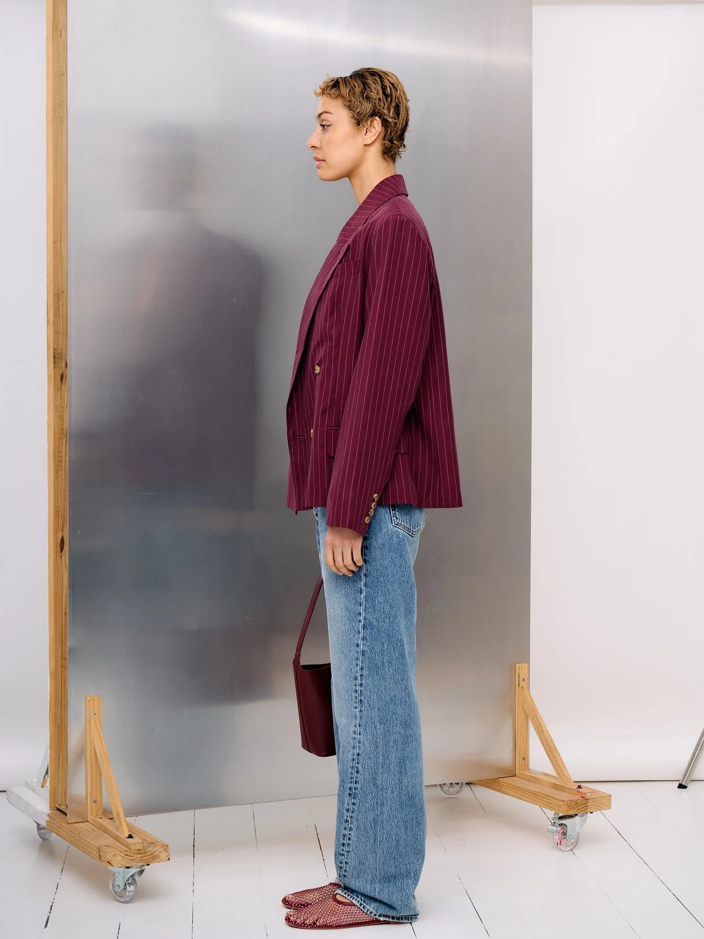 Suit up, dress down. The pinstripe blazer meets off-duty denim.