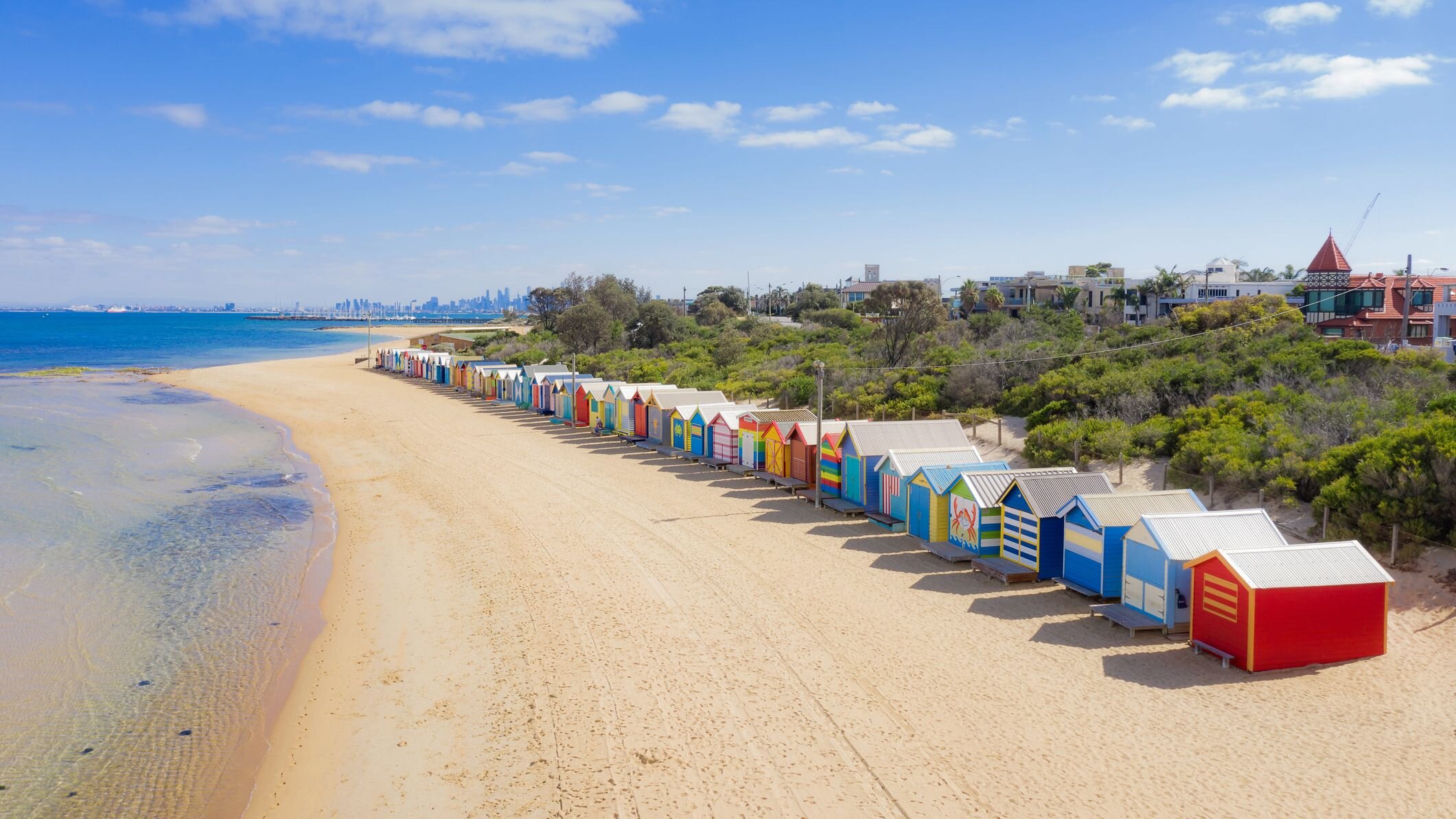 aerial-view-of-brighton-bathing-boxes-on-white-sandy-beach-at-brighton-beach-in-melbourne--victoria--australia--1134480493-4ebbe192a17144cfa8f82eac988da916.jpg