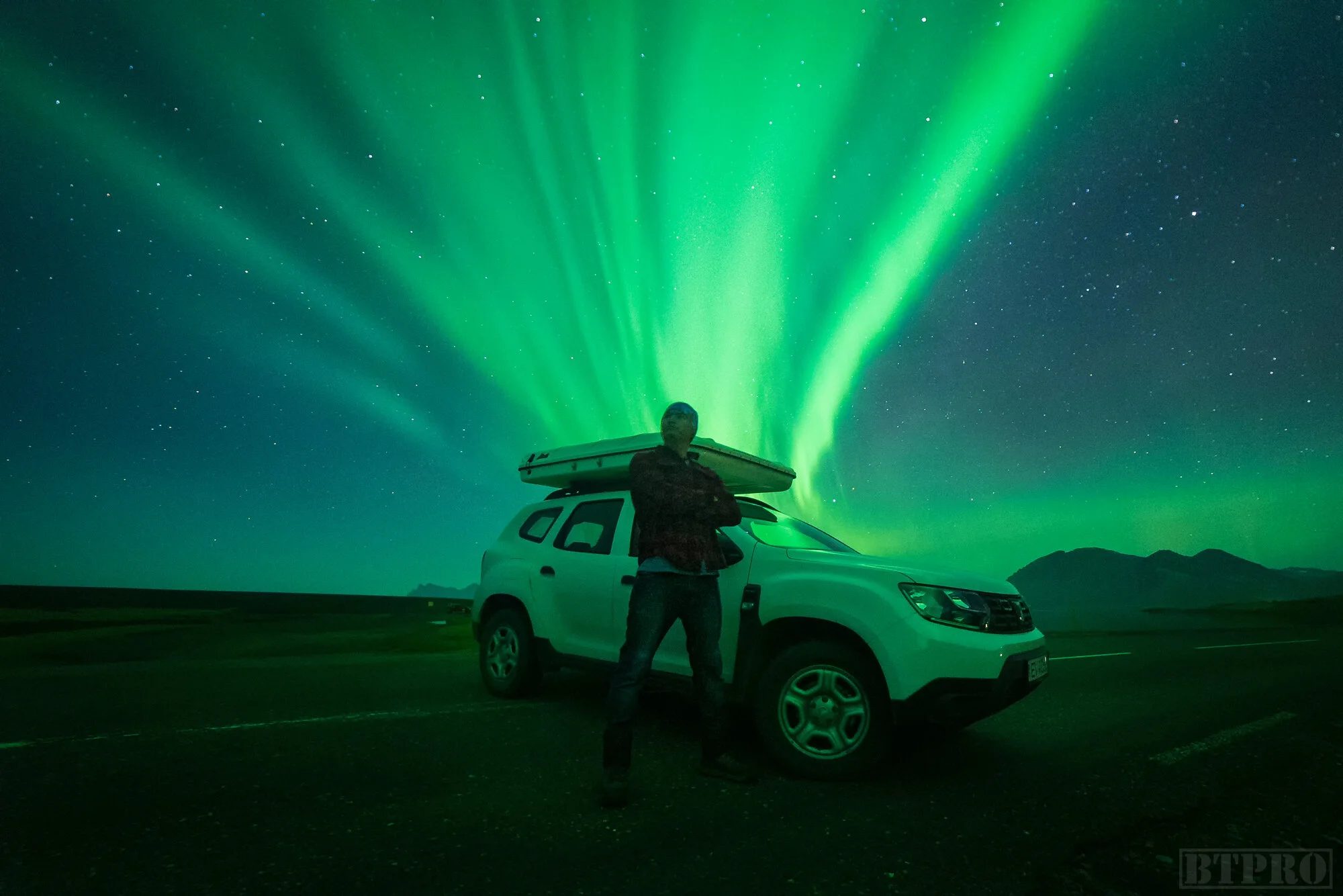 Auroras on the Road Next to Eystrahorn