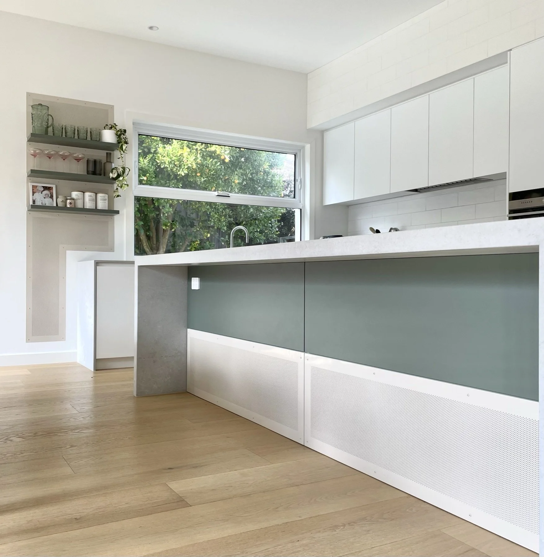  Under island bench added panelling and wall feature shelves and panels. 