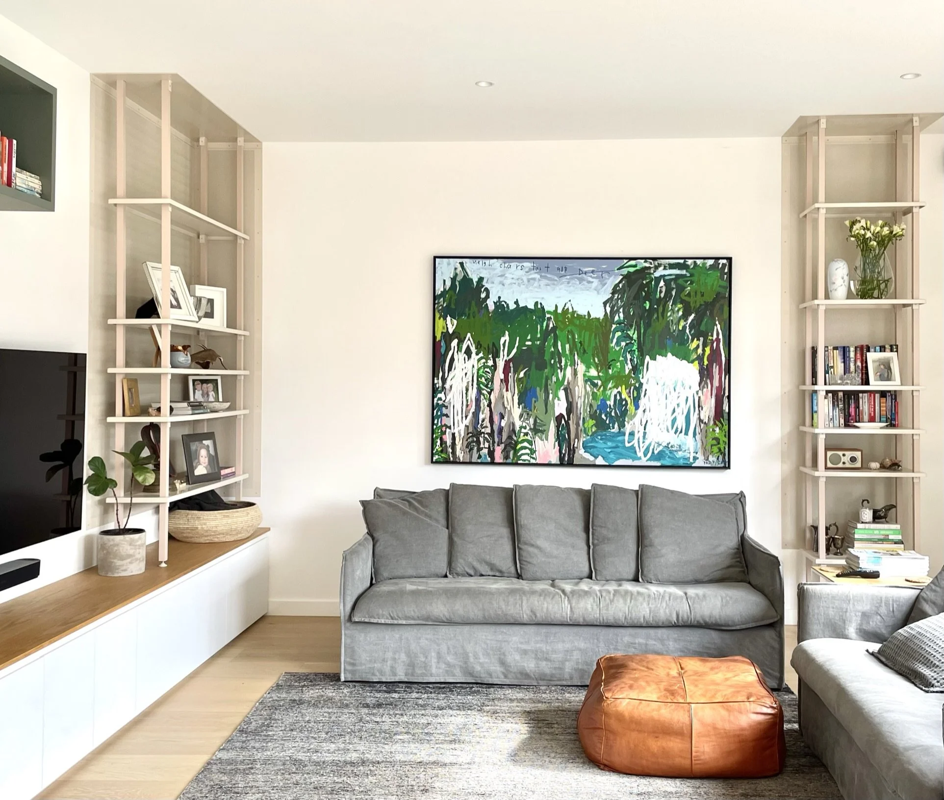  Living area brought together by metal shelves proposed in specific locations. 