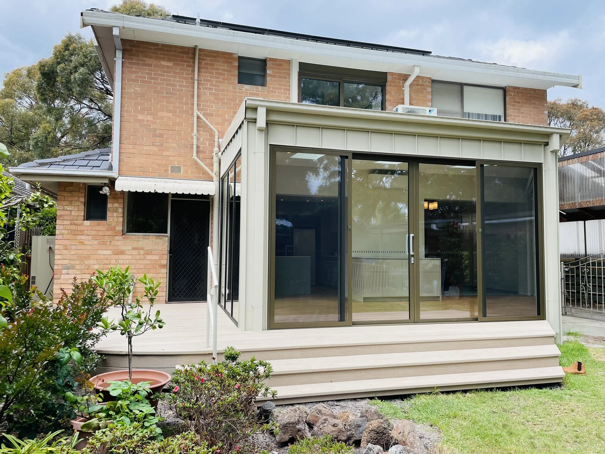 Sunroom view perfectly designed for the existing conditions including existing services.