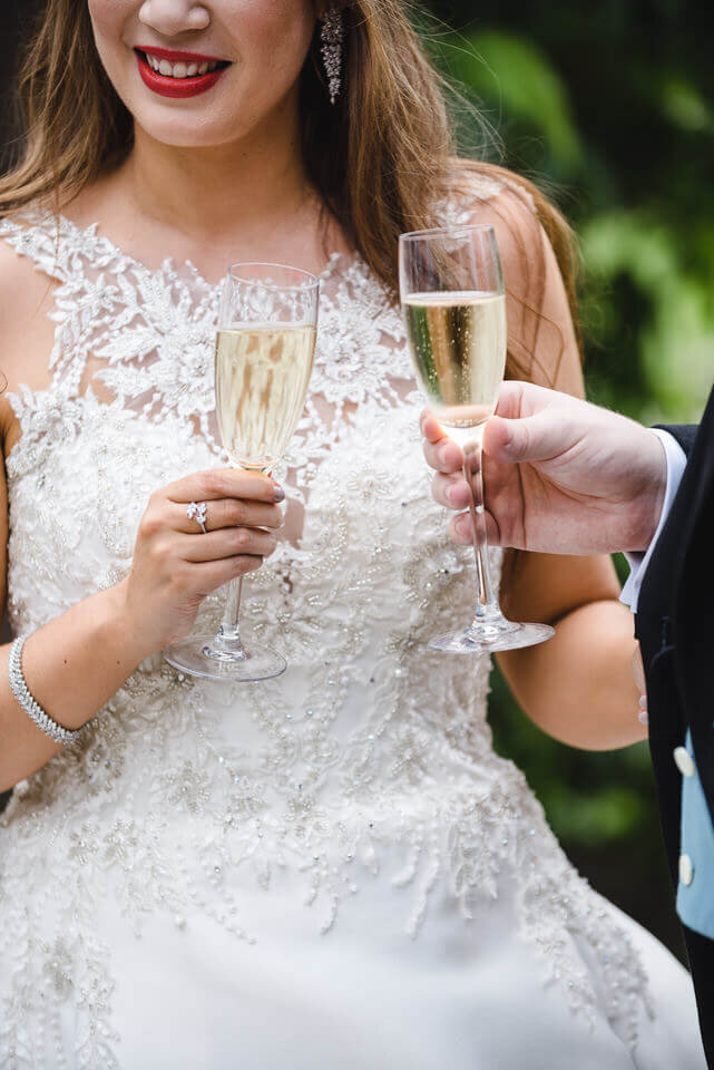 Fulham Palace wedding bride with champagne