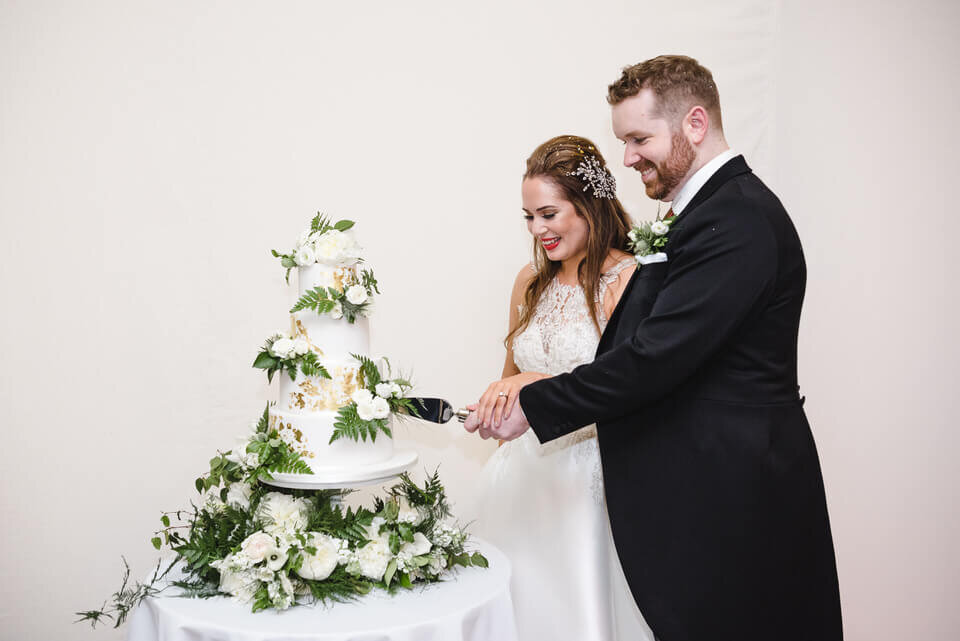 Cutting the cake - Fulham Palace Wedding