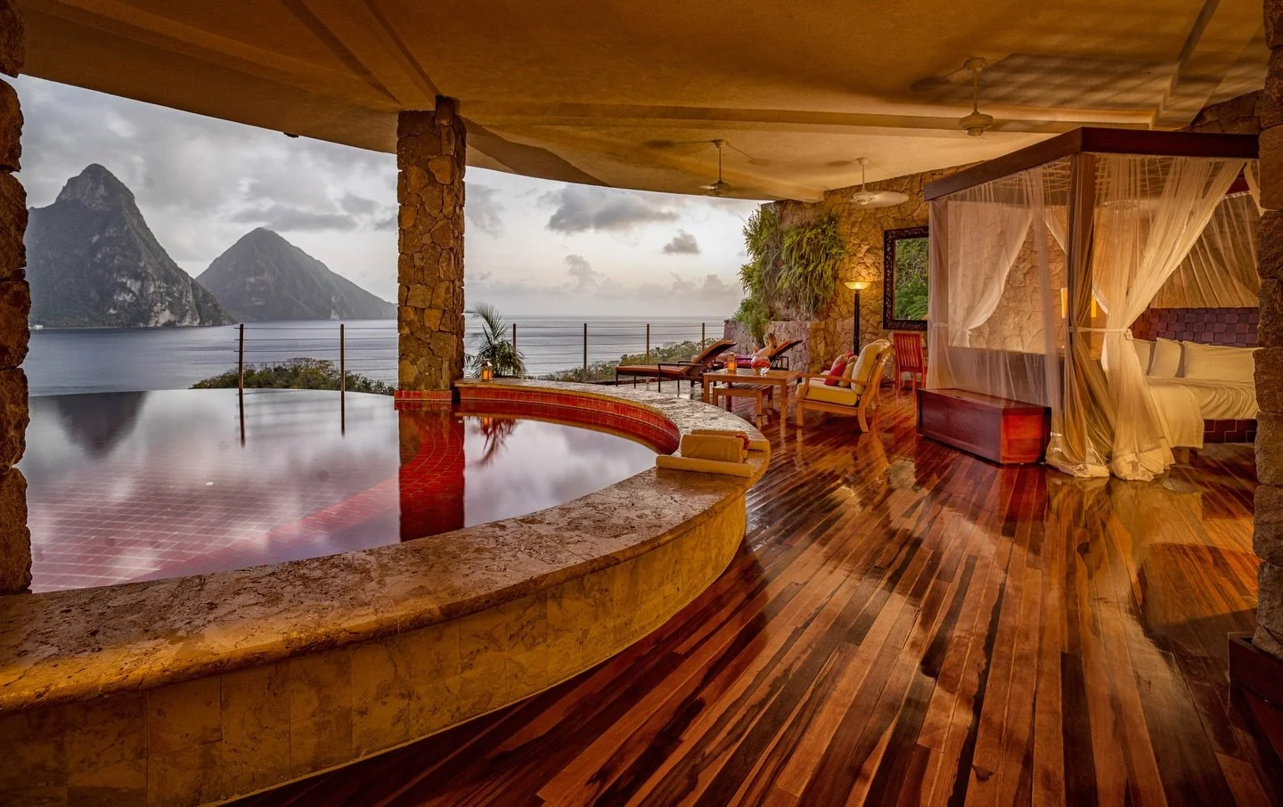 JADE MOUNTAIN 
Perched high above the coastline, this architecturally iconic haven offers a kind of beauty you won&rsquo;t find anywhere else in the Caribbean. Its sanctuaries (bedrooms) are truly unique: open on one side, with no fourth wall, giving