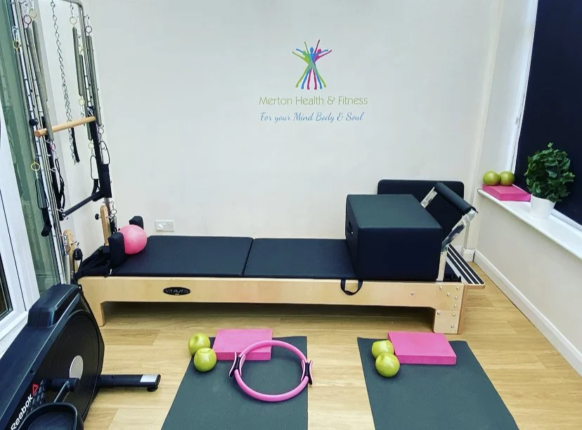 Reformer pilates bed in private studio with all Pilates equipment