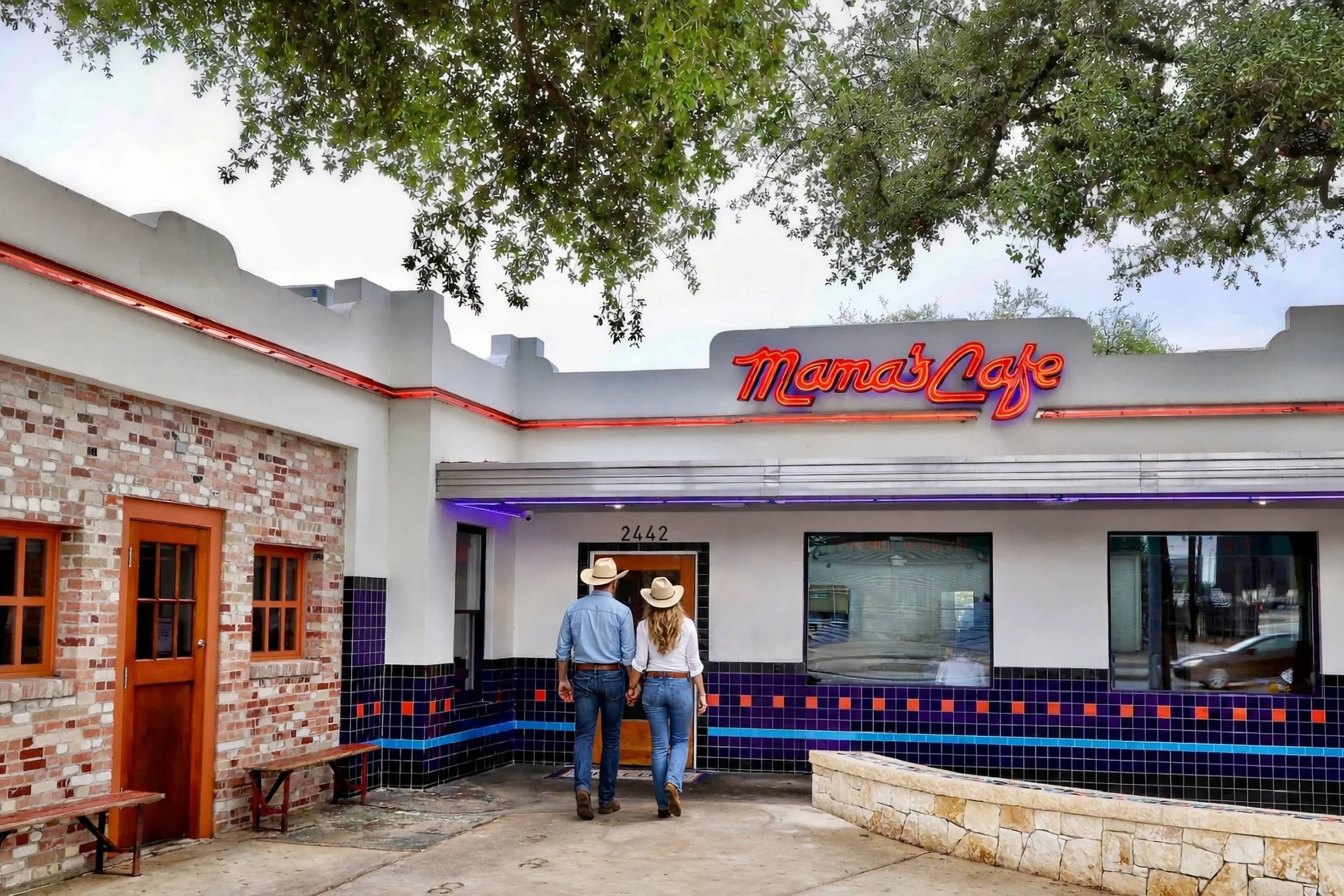 cowboy couple walking through beautiful Mama's Café entrance