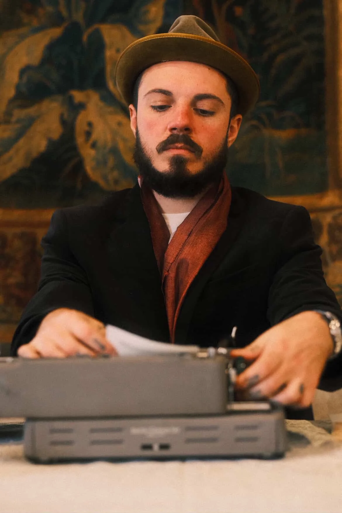 Pierce Logan, typewriter poet from New Jersey and member of With Ink with photo credit to Photo by J.T. Sammis.